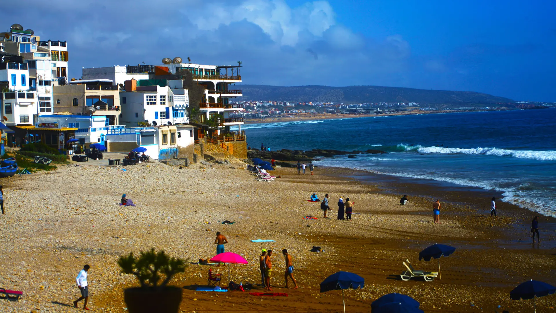 Taghazout village buildings beside the Atlantic beach in daylight