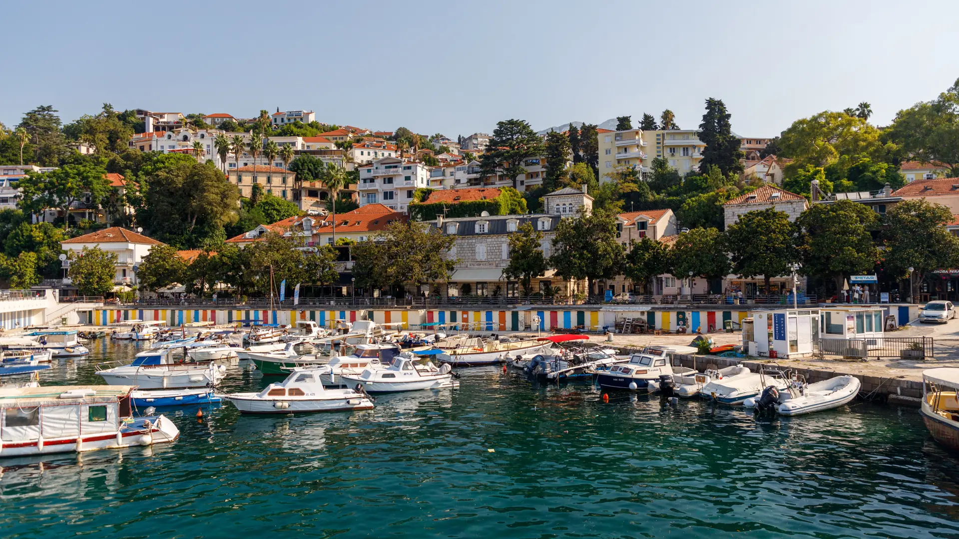 Herceg Novi marina and hillside Old Town beside the bay in daylight