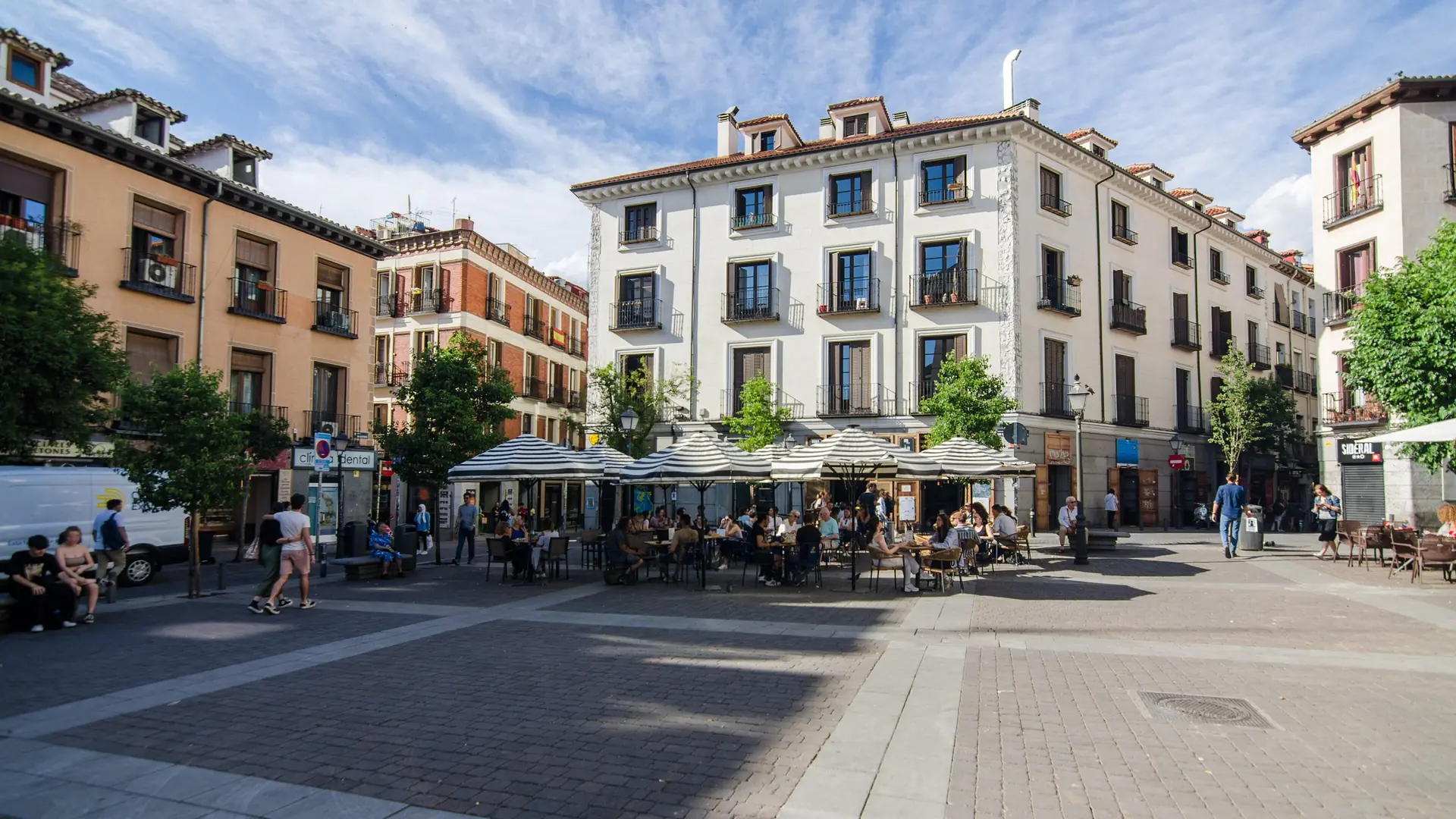 Café terraces and balconies around Plaza de San Ildefonso in Madrid’s Malasaña district