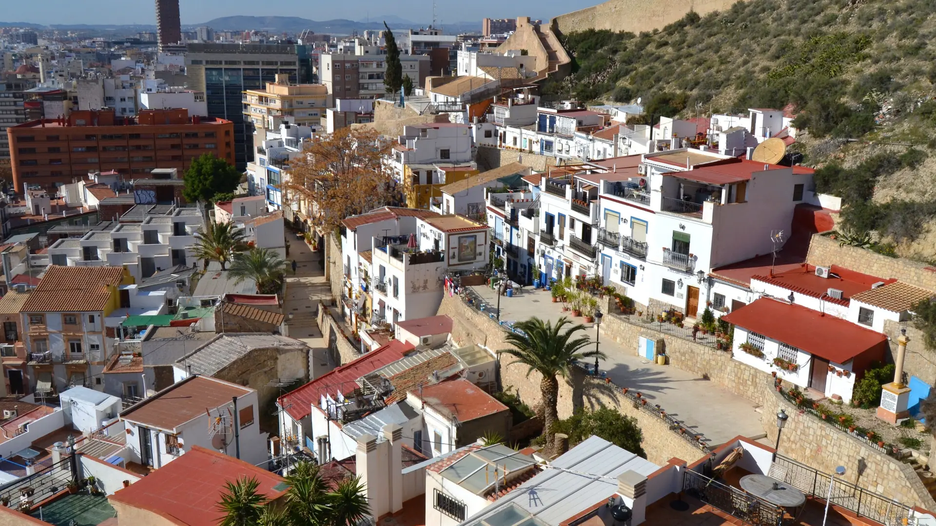 Santa Cruz rooftops and colourful houses seen from Parque de la Ereta in Alicante