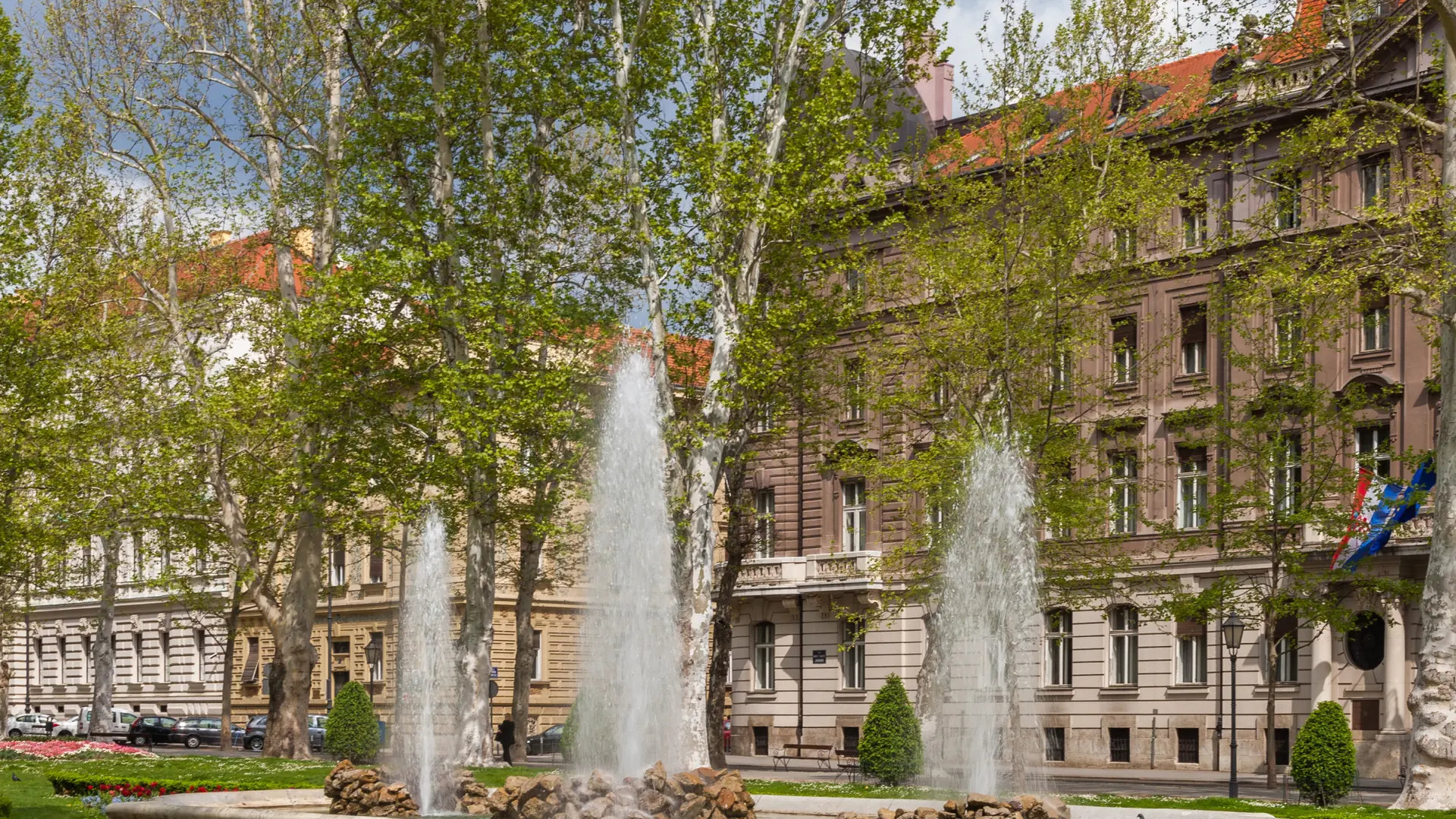 Zagreb Lower Town park, plane trees and historic Austro-Hungarian façades