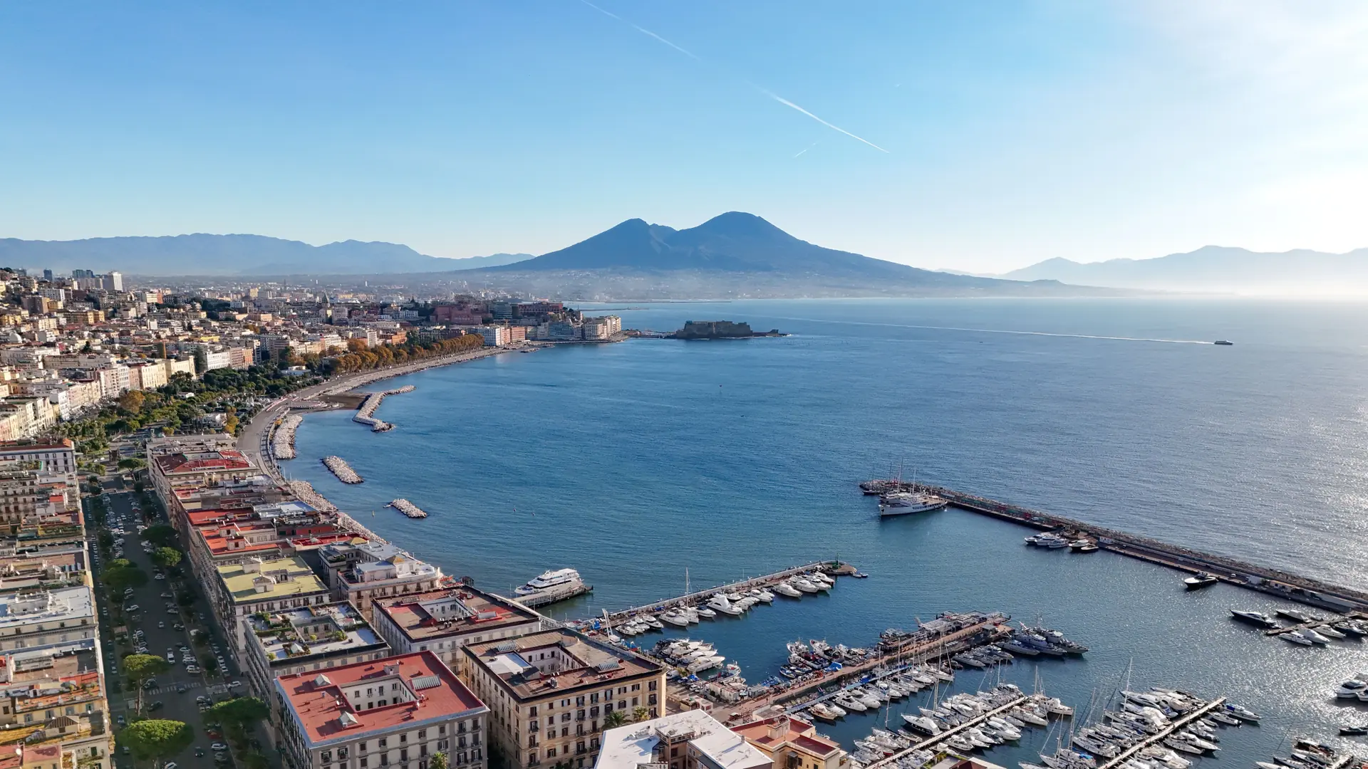 Mount Vesuvius and Castel dell’Ovo seen across the Bay of Naples.