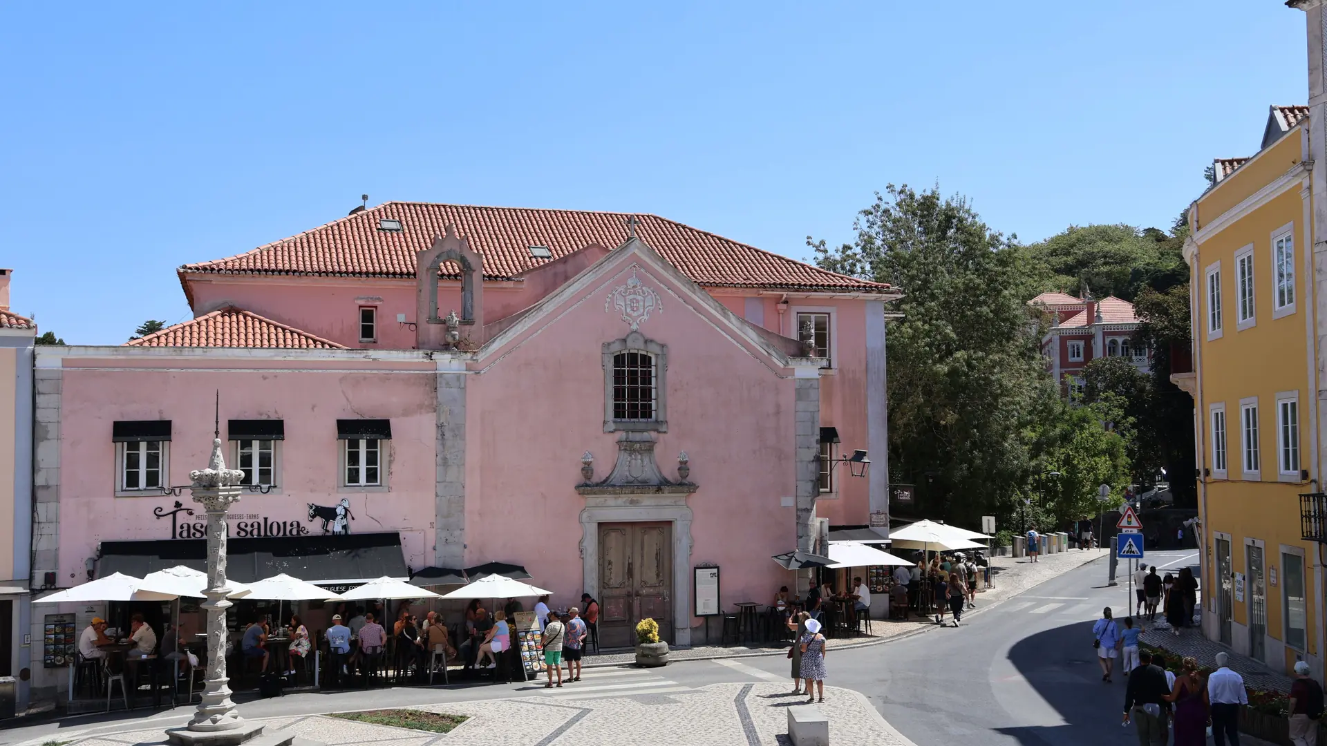 Colourful street and outdoor cafés in the town of Sintra