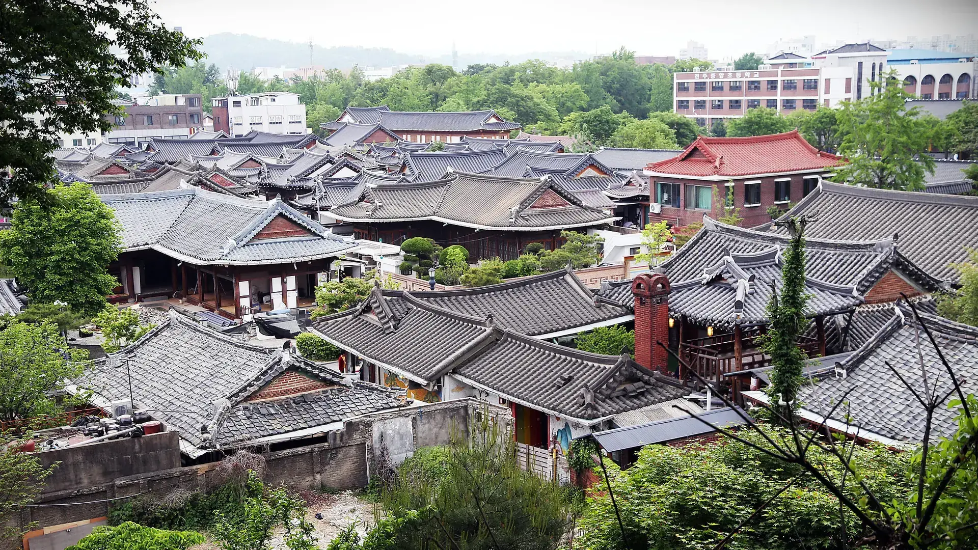 Elevated daylight view over the tiled rooftops of Jeonju Hanok Village