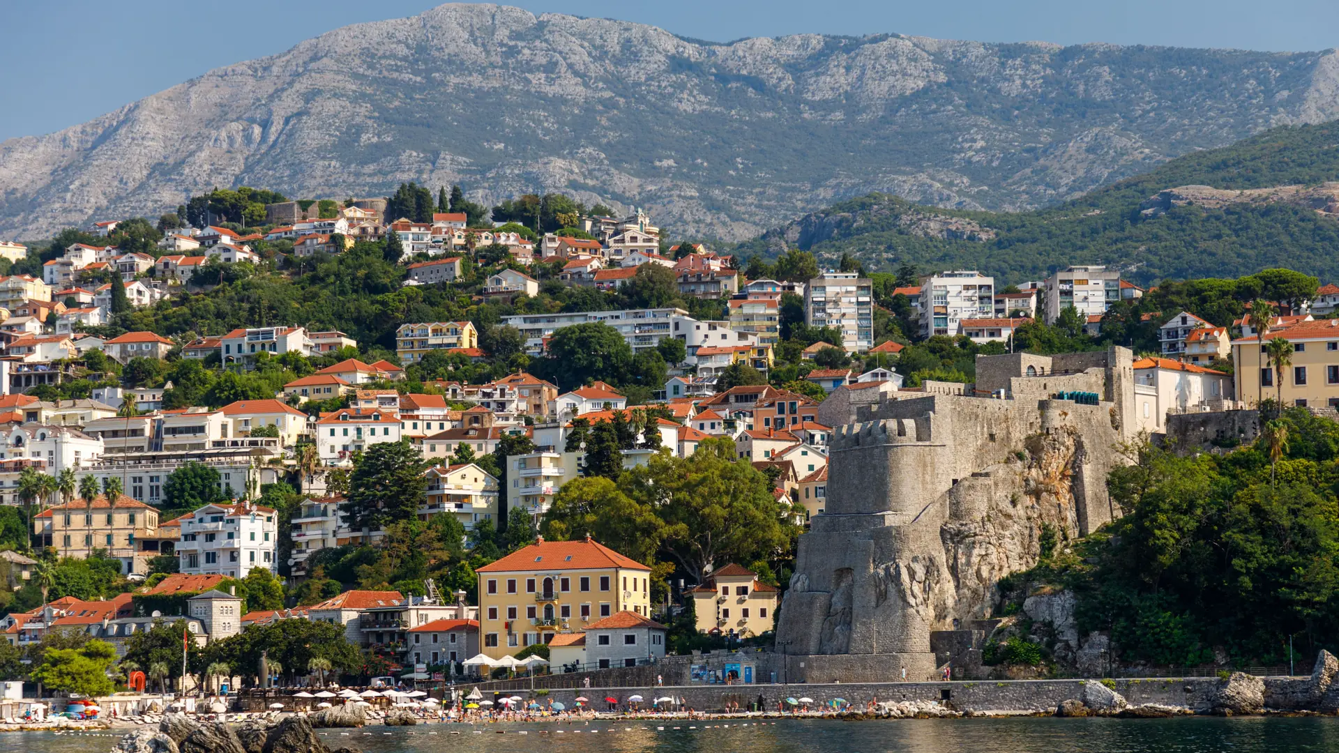 Herceg Novi old town and green bay shoreline in natural daylight