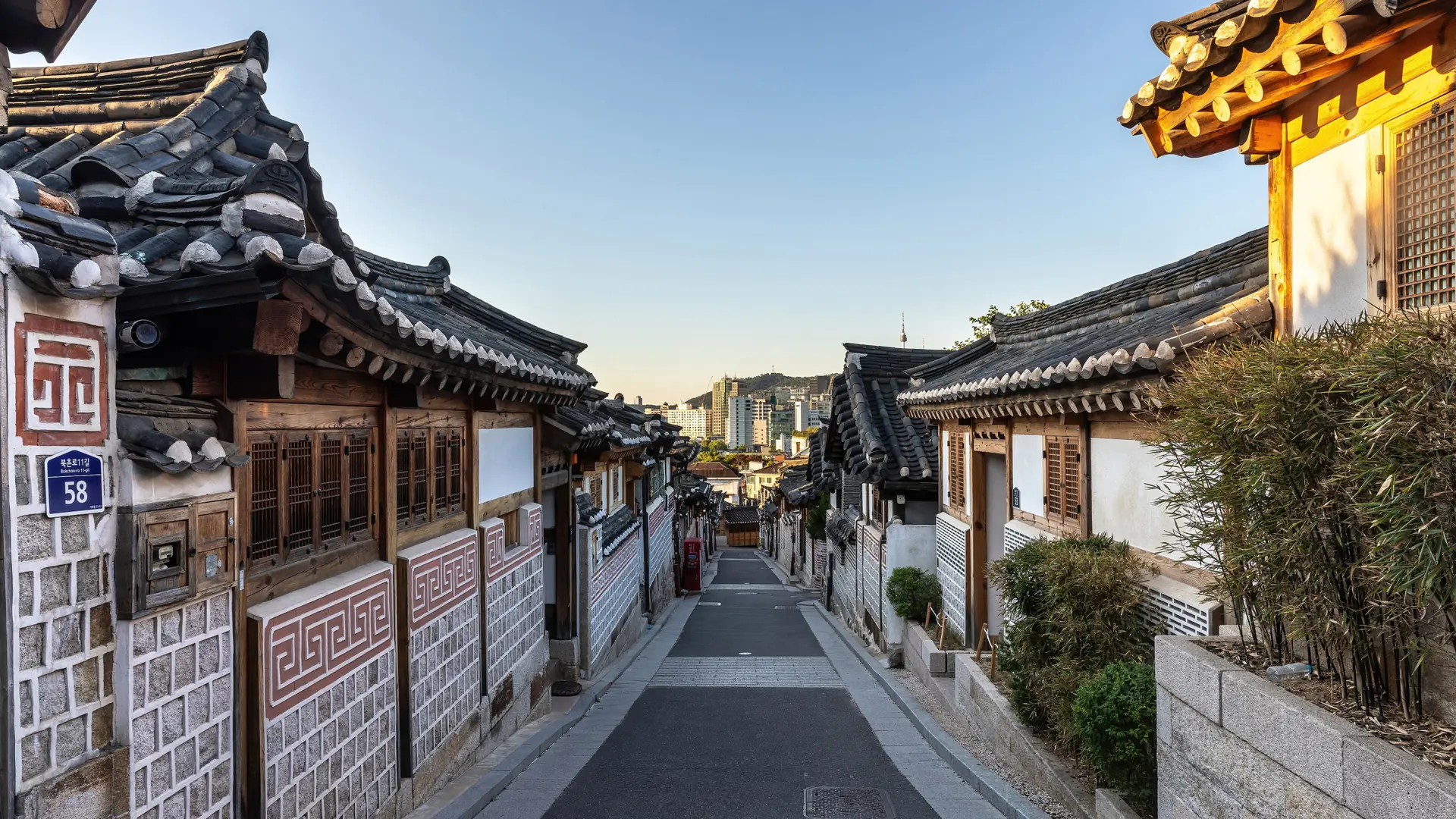 Tiled roofs and traditional wooden houses in Bukchon Hanok Village, Seoul