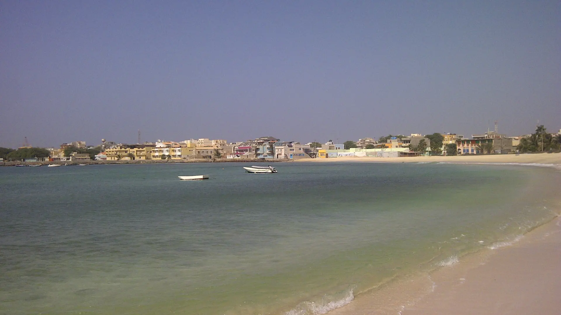 Pale Sal Rei beachfront and turquoise sea on Boa Vista