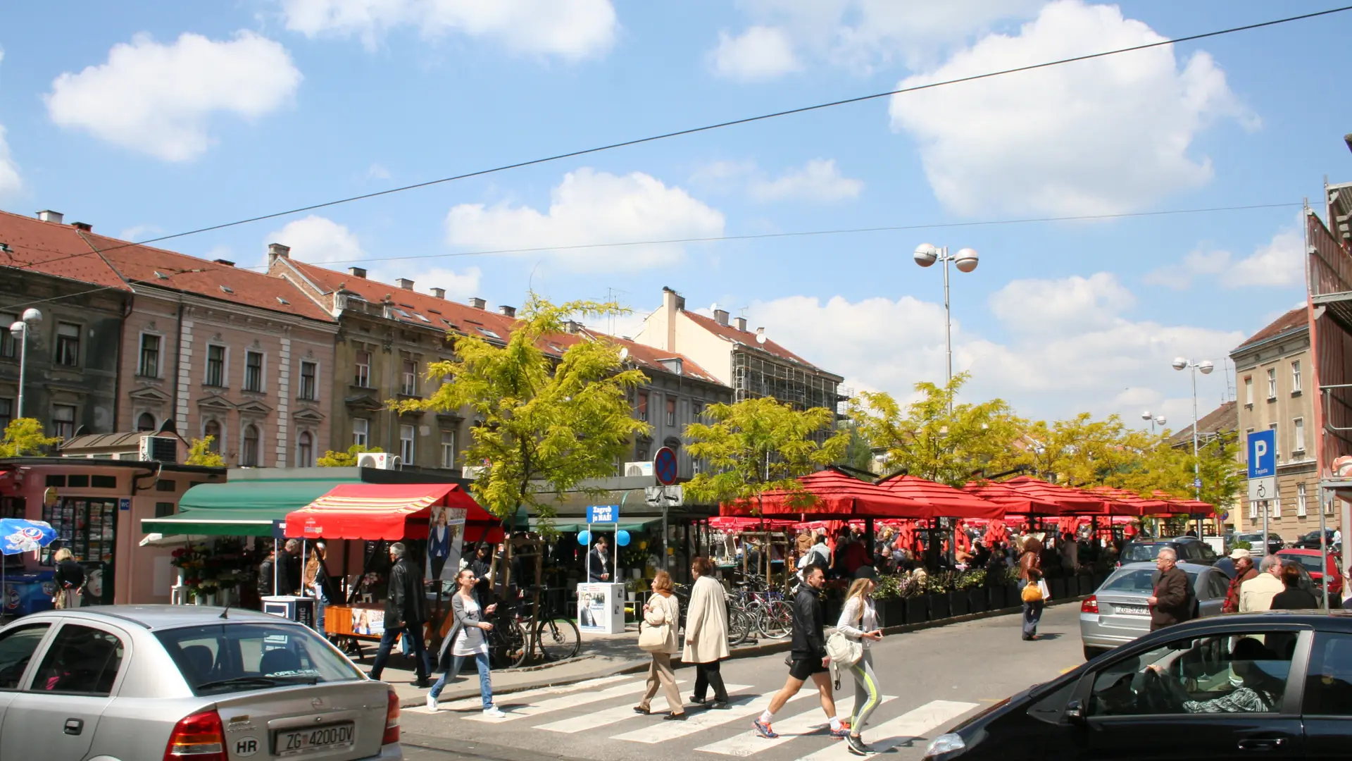 Sunny Britanski trg market square with café terraces and Zagreb façades