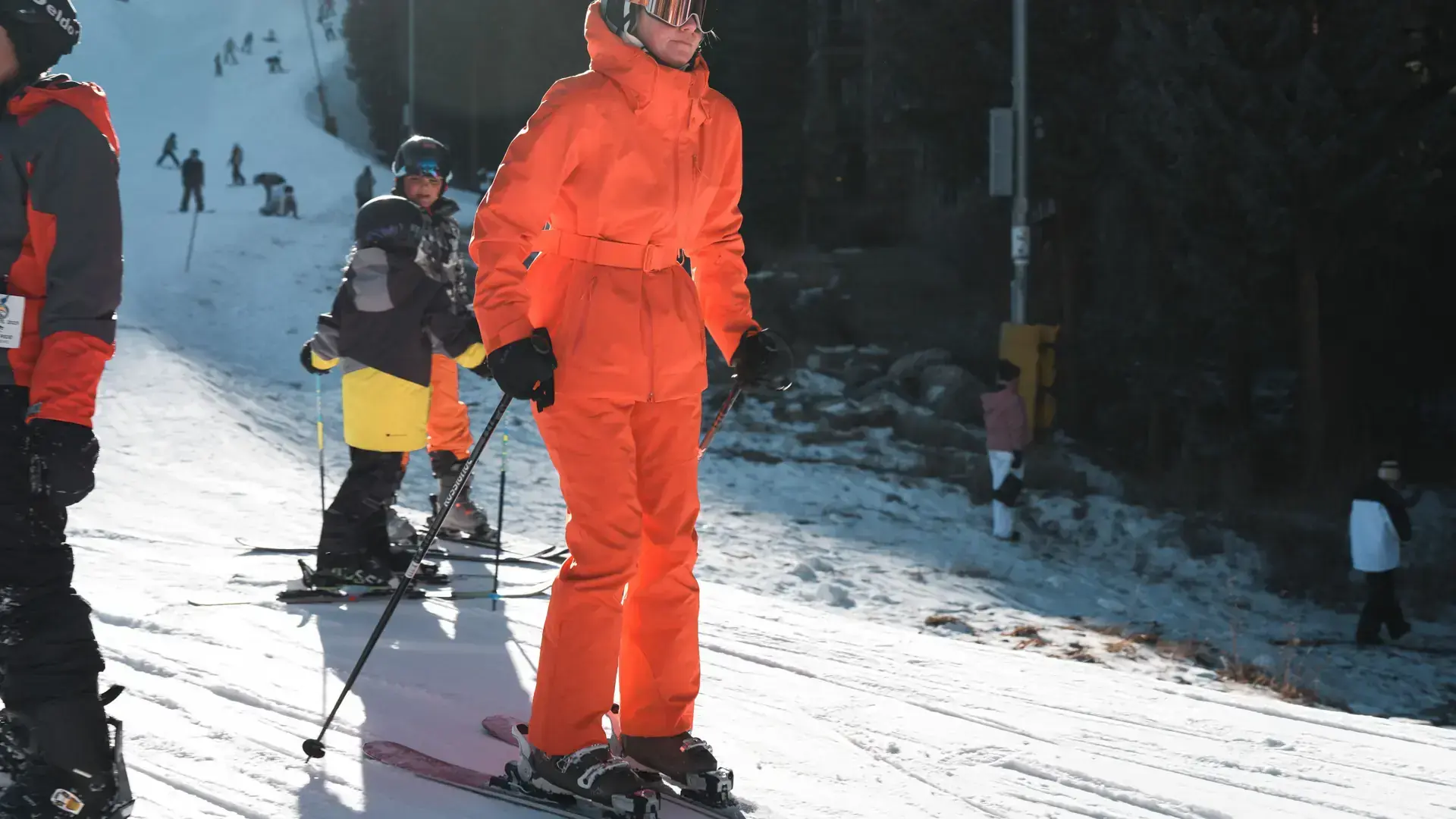 Skiers on a bright, sunny snow slope at a South Korean ski resort