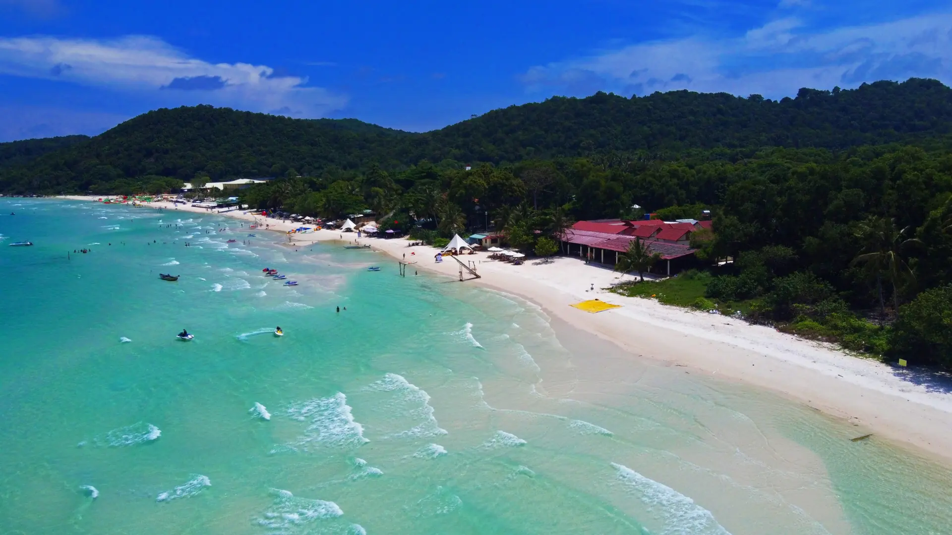 Bright Bai Sao beach, white sand and shallow blue sea