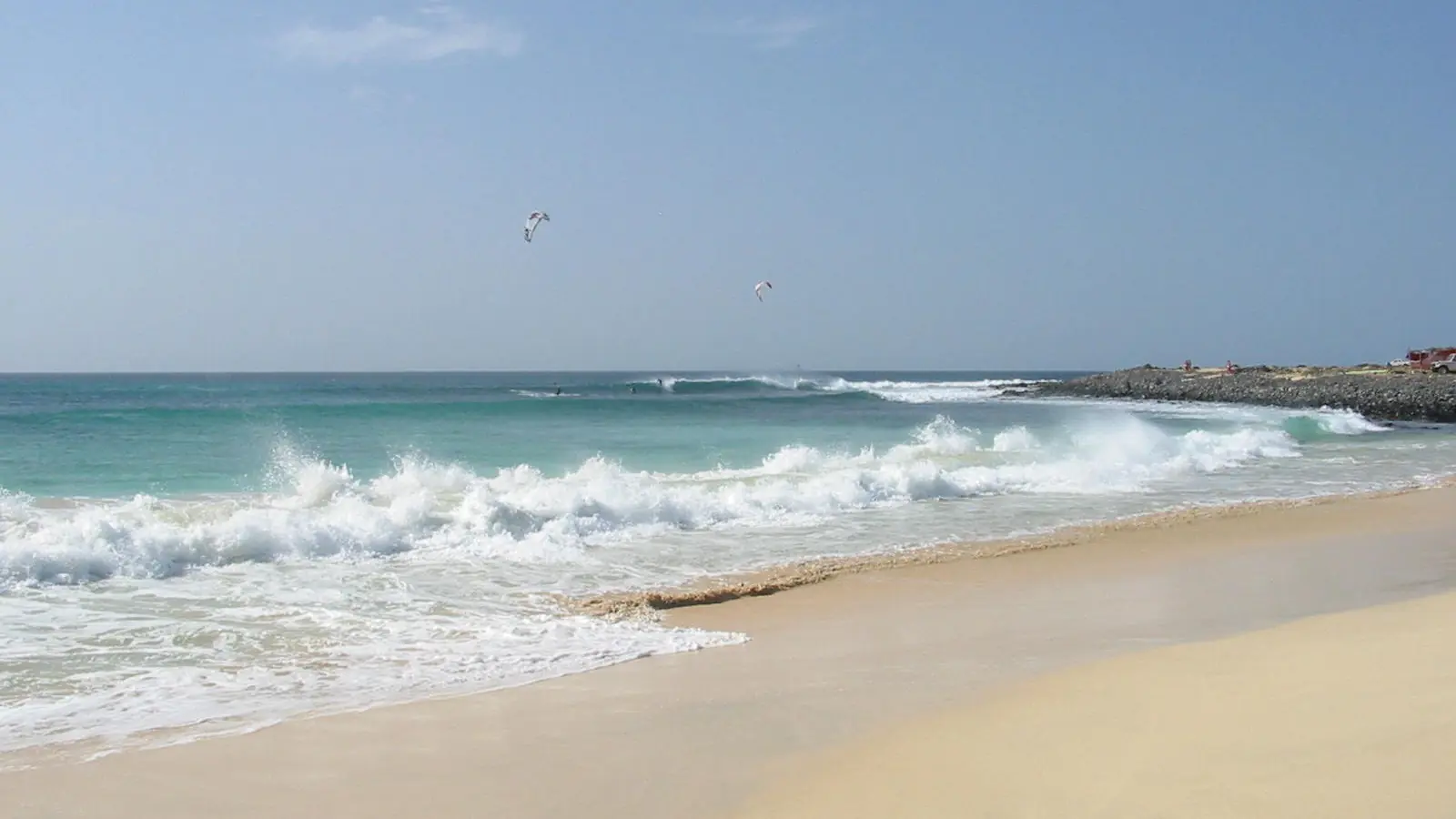 Sunny Atlantic surf and sandy shore at Santa Maria on Sal