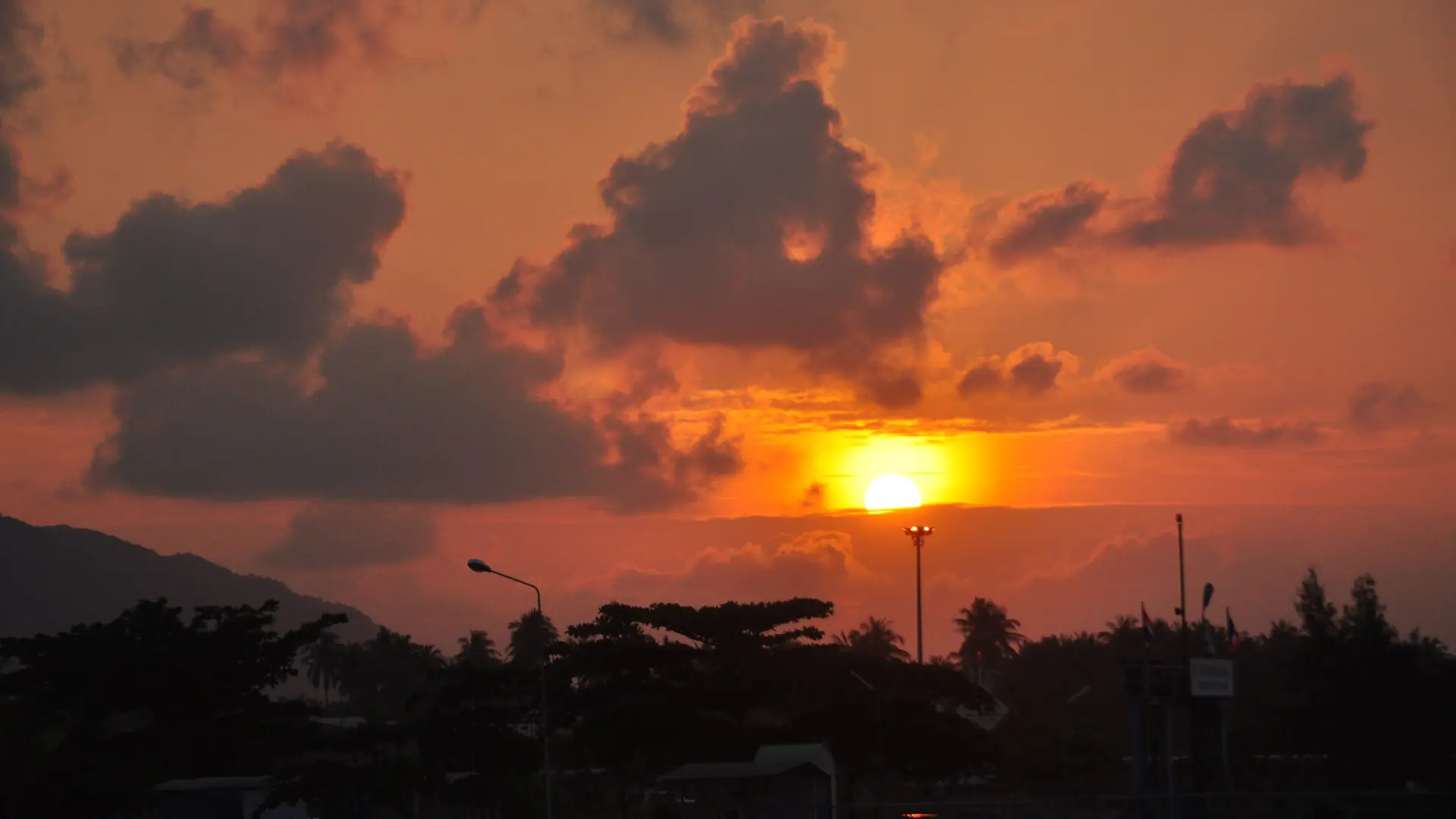 Sunrise colour spreading across the sea off Koh Phangan