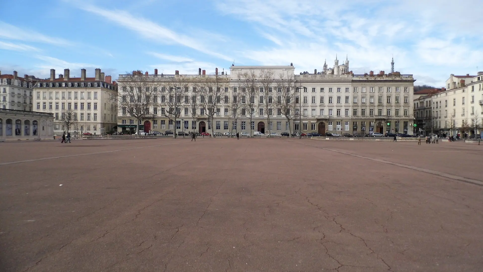 Place Bellecour with Lyon’s façades and Fourvière in the distance