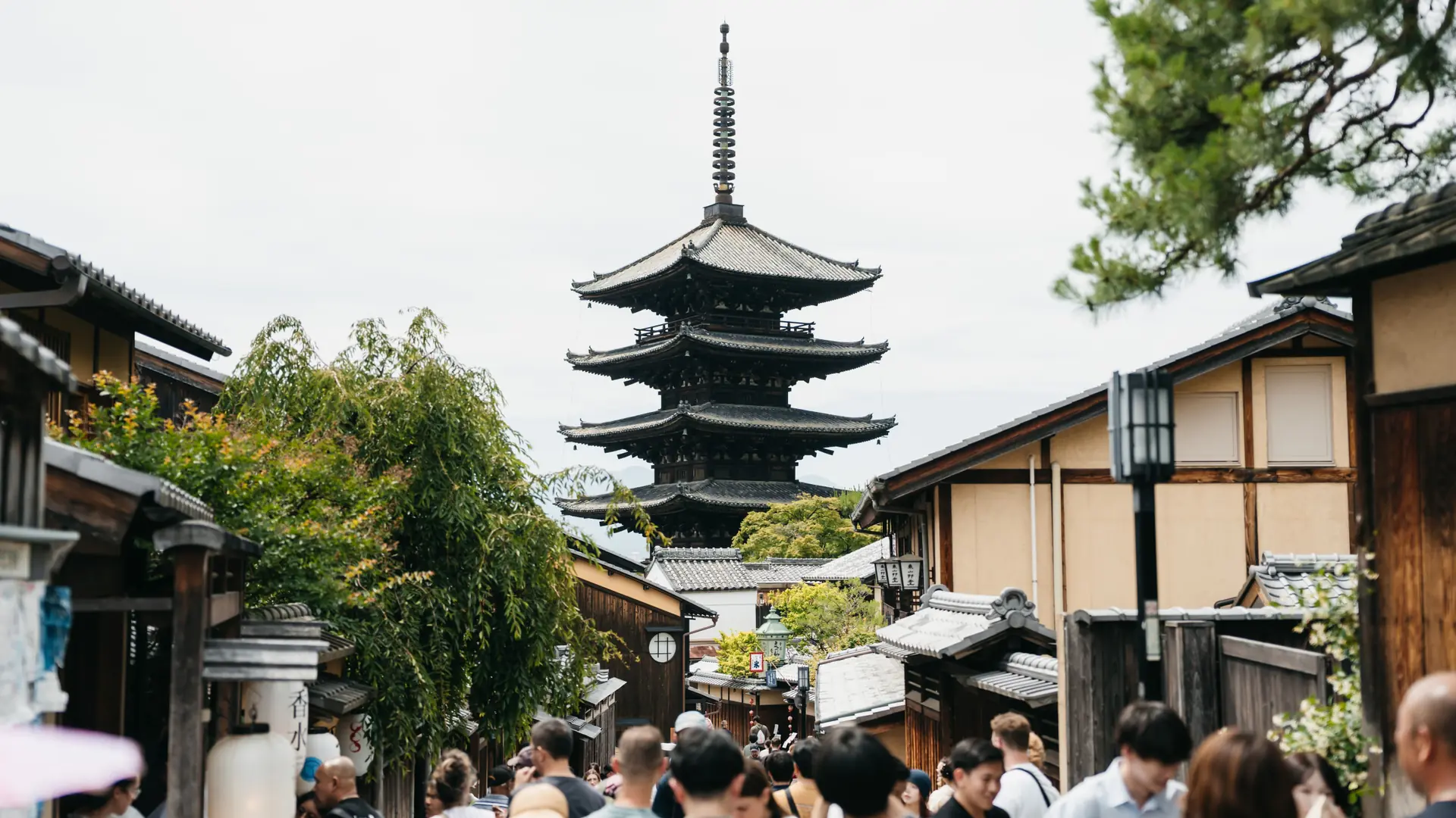 Traditional wooden machiya and stone lane in Kyoto's Higashiyama district