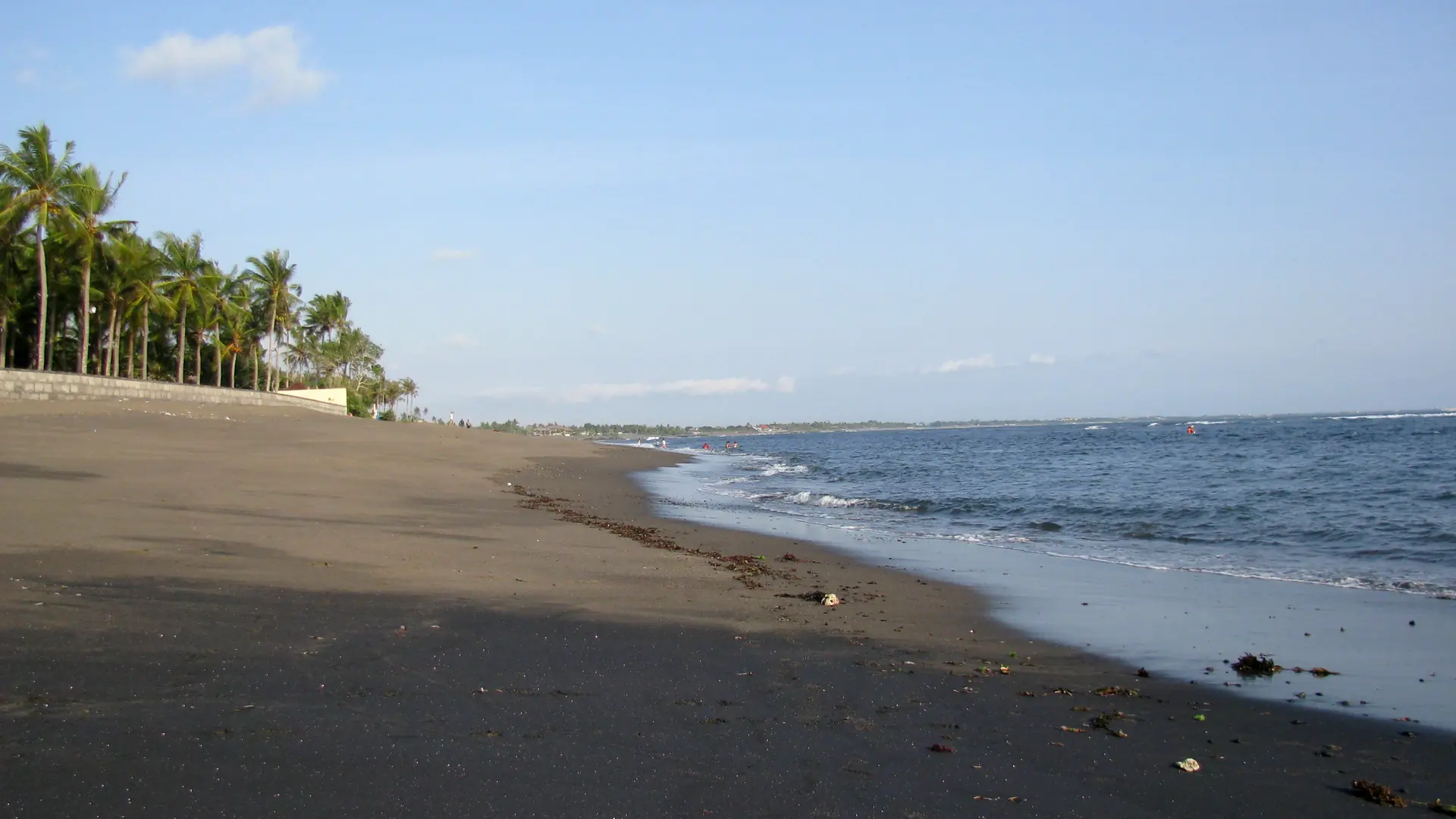 Black-sand coastline in northern Canggu, looking towards Seminyak