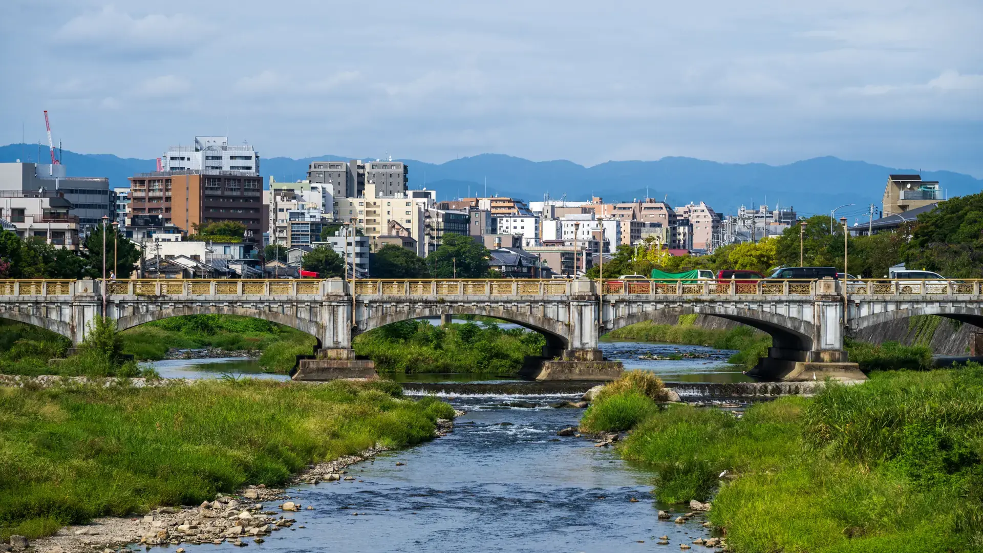 bright central Kyoto cityscape beside the broad Kamo River