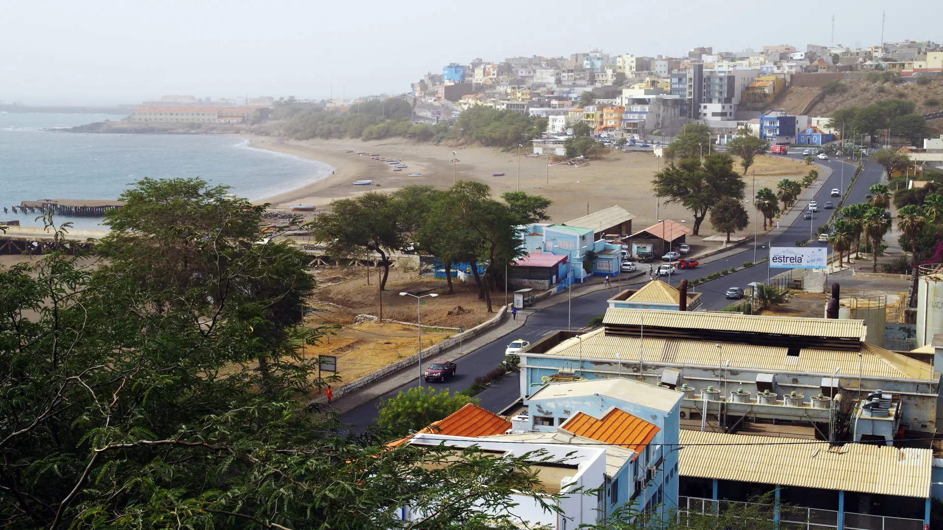 Daylit Praia coastline, city buildings and Atlantic bay on Santiago