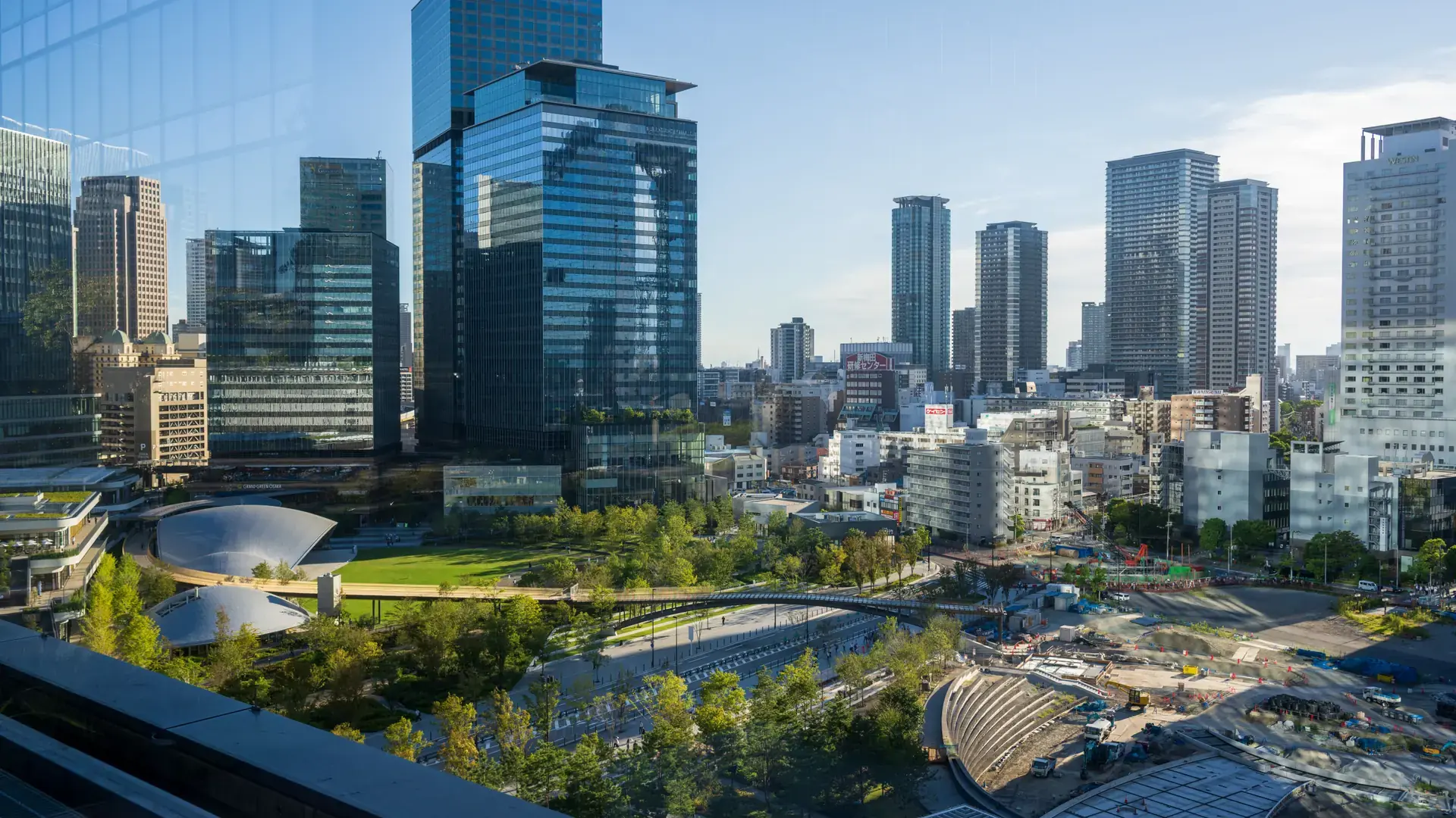 sunny modern Osaka skyline around Umeda and Osaka Station