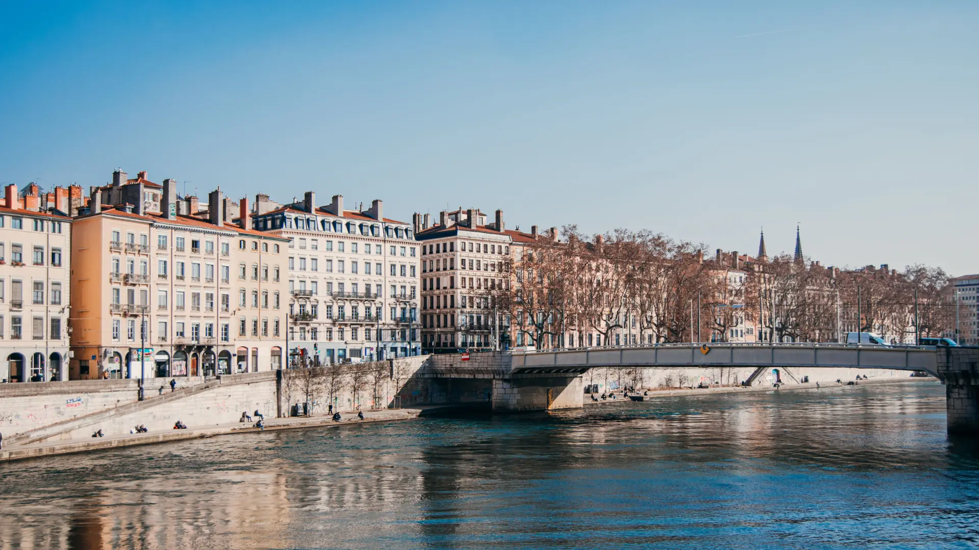 The Saône and Pont Bonaparte in sunny Lyon, illustrating the wider city rather than Guillotière