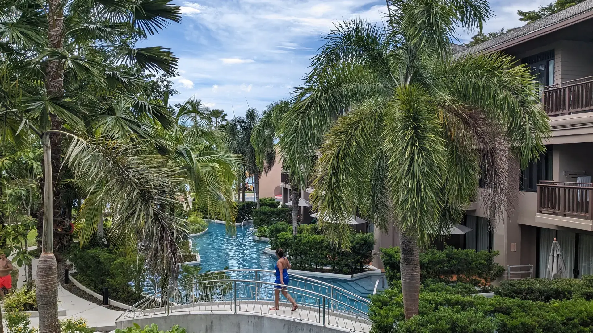 Pool and tropical gardens at La Flora in Bang Niang, a wider Khao Lak scene