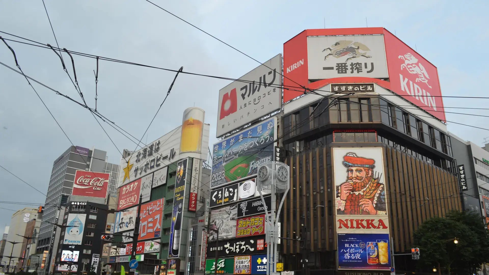 colourful Susukino crossing and neon signs in clear evening light