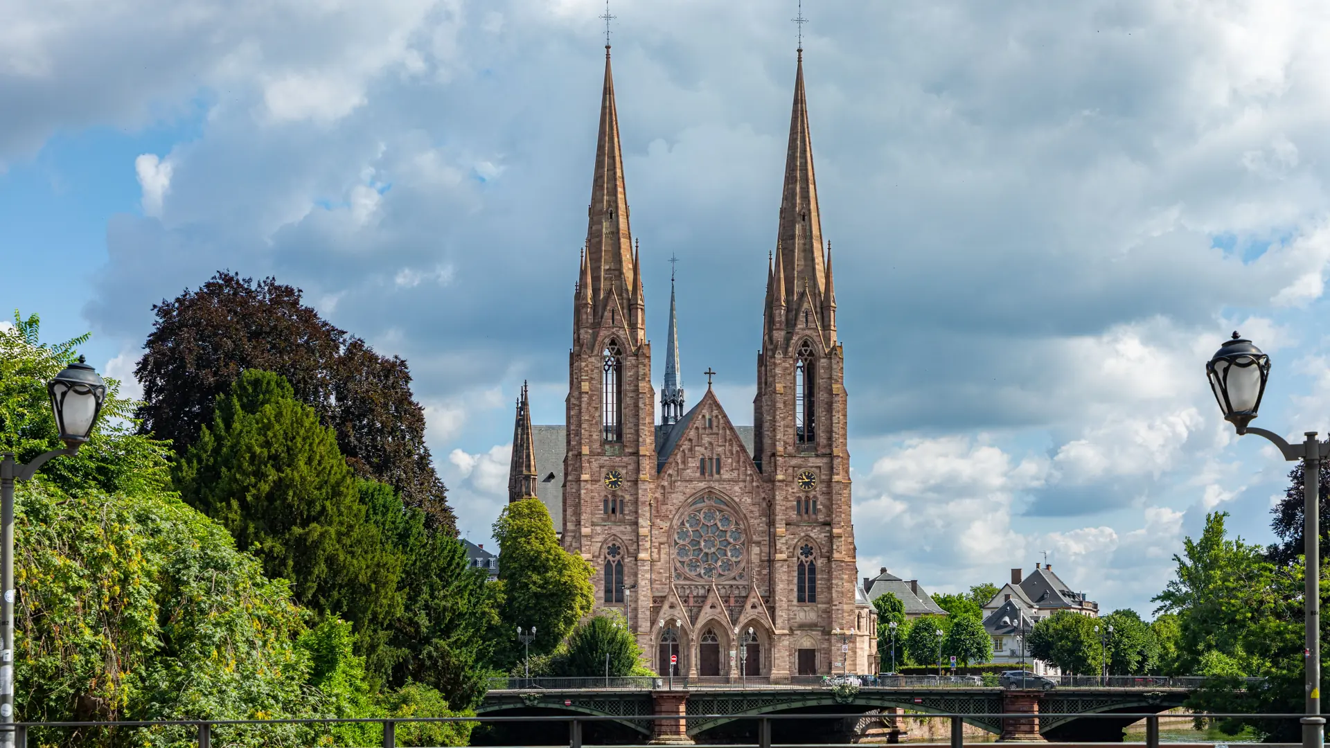 Saint Paul’s church and riverside greenery in Strasbourg, shown as a wider city scene