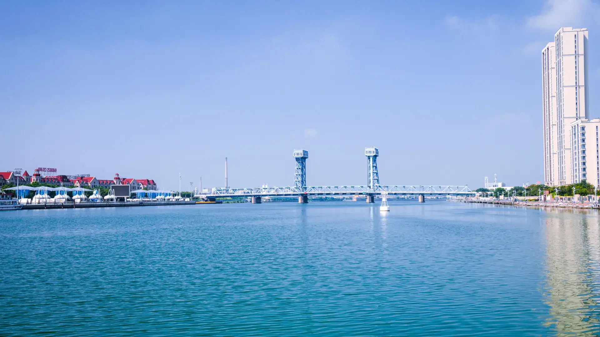 bright Osaka Bay waterfront with colourful Universal City skyline