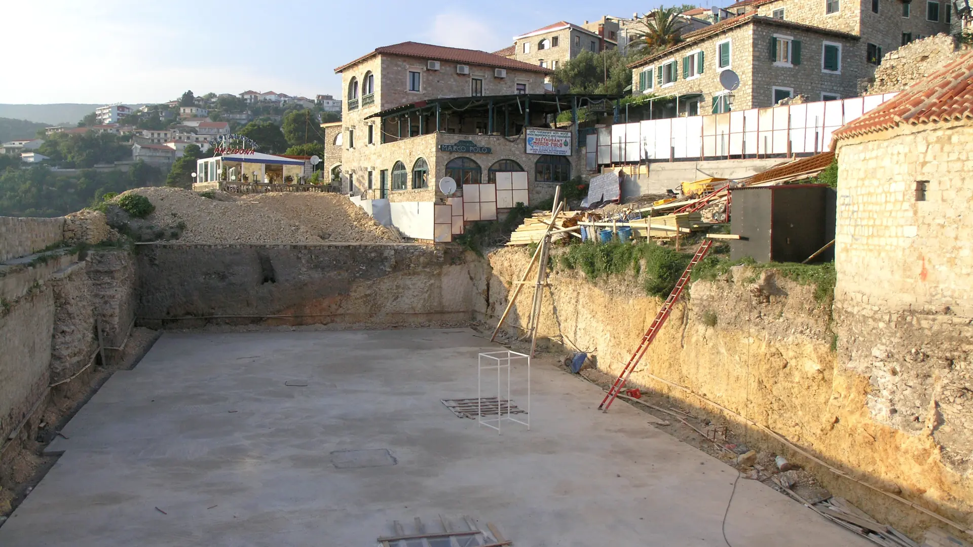 Stone houses and walls above an open courtyard inside Ulcinj Old Town