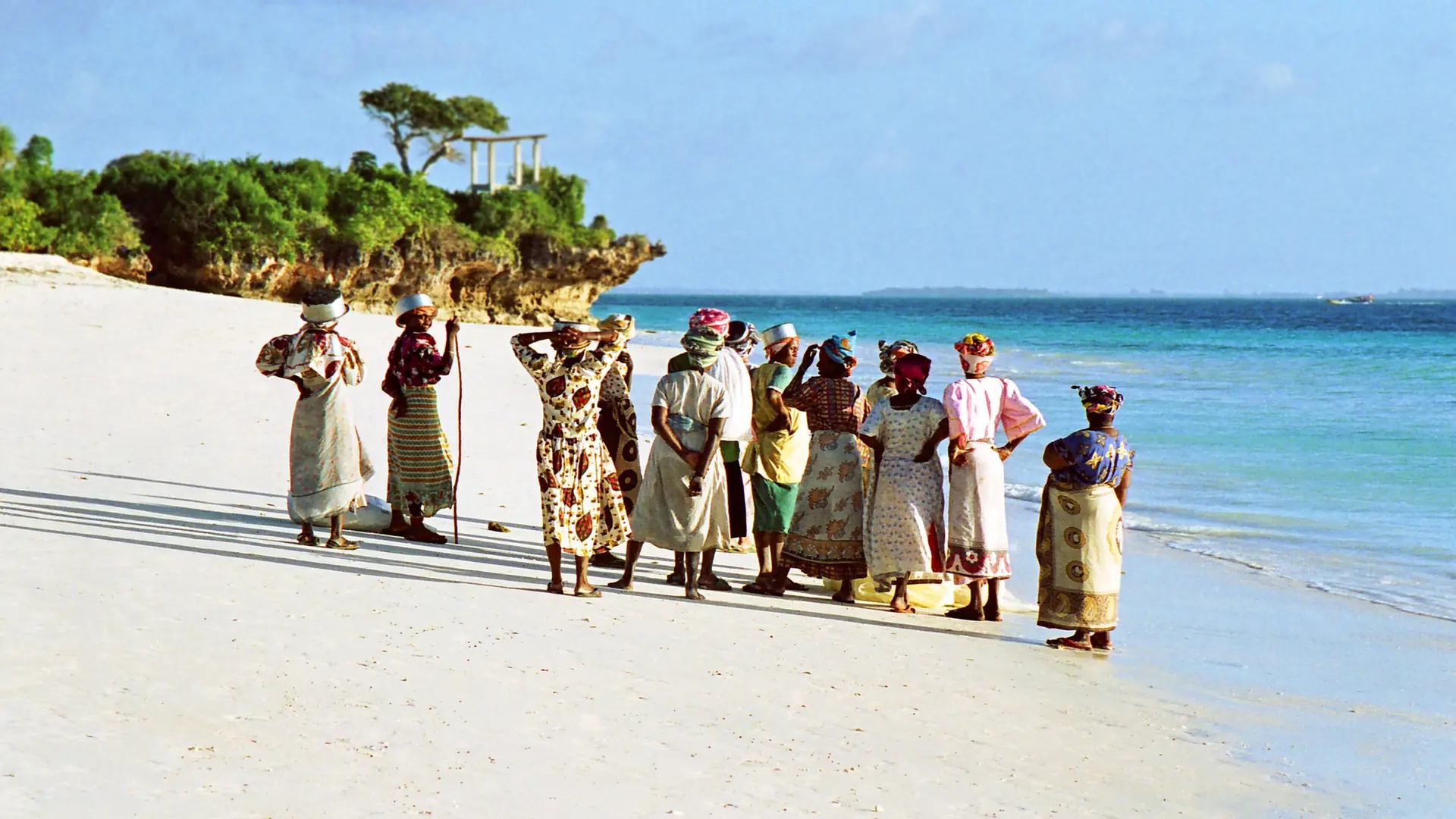 Women setting out to fish from the beach at Nungwi