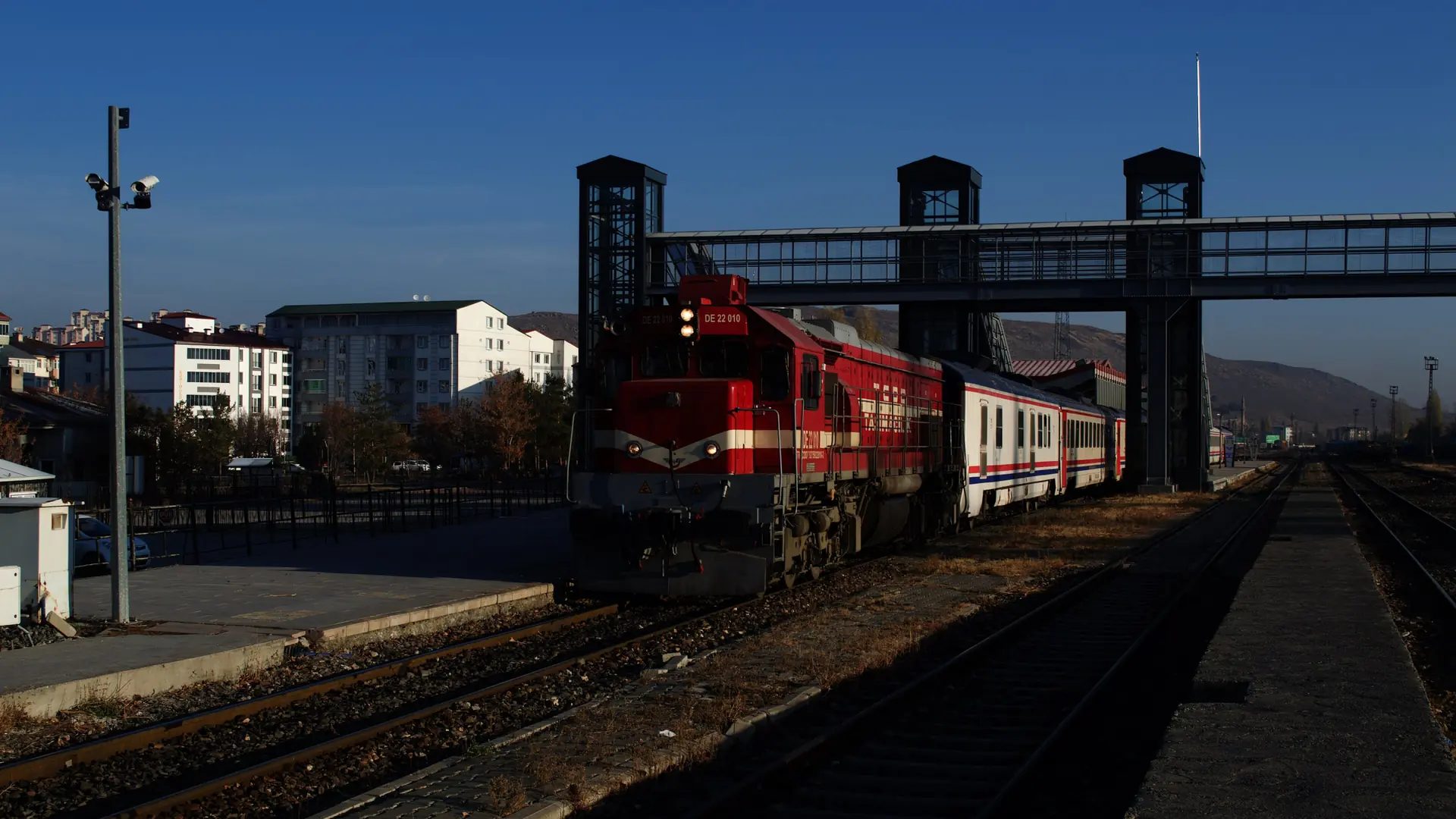 Red Doğu Ekspresi locomotive waiting at Kars station