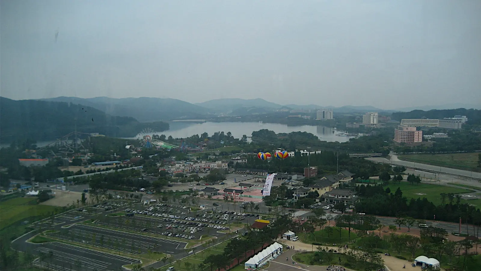 Aerial view of Bomun Lake, the Gyeongju World amusement park and resort hotels in daylight
