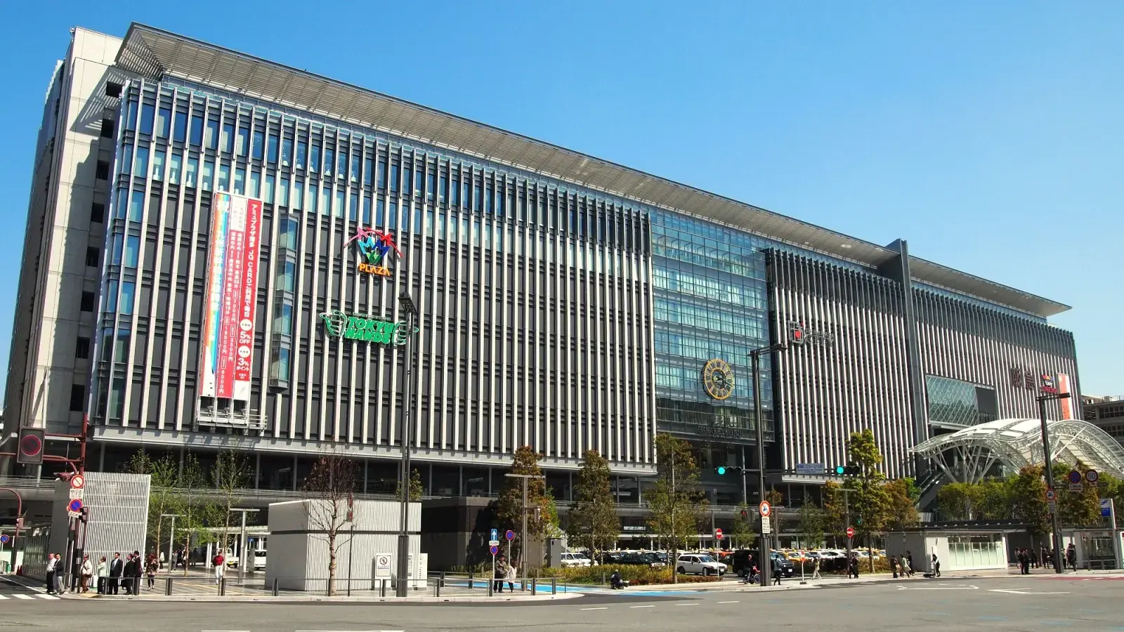 JR Hakata City and its broad station plaza glowing in clear daylight