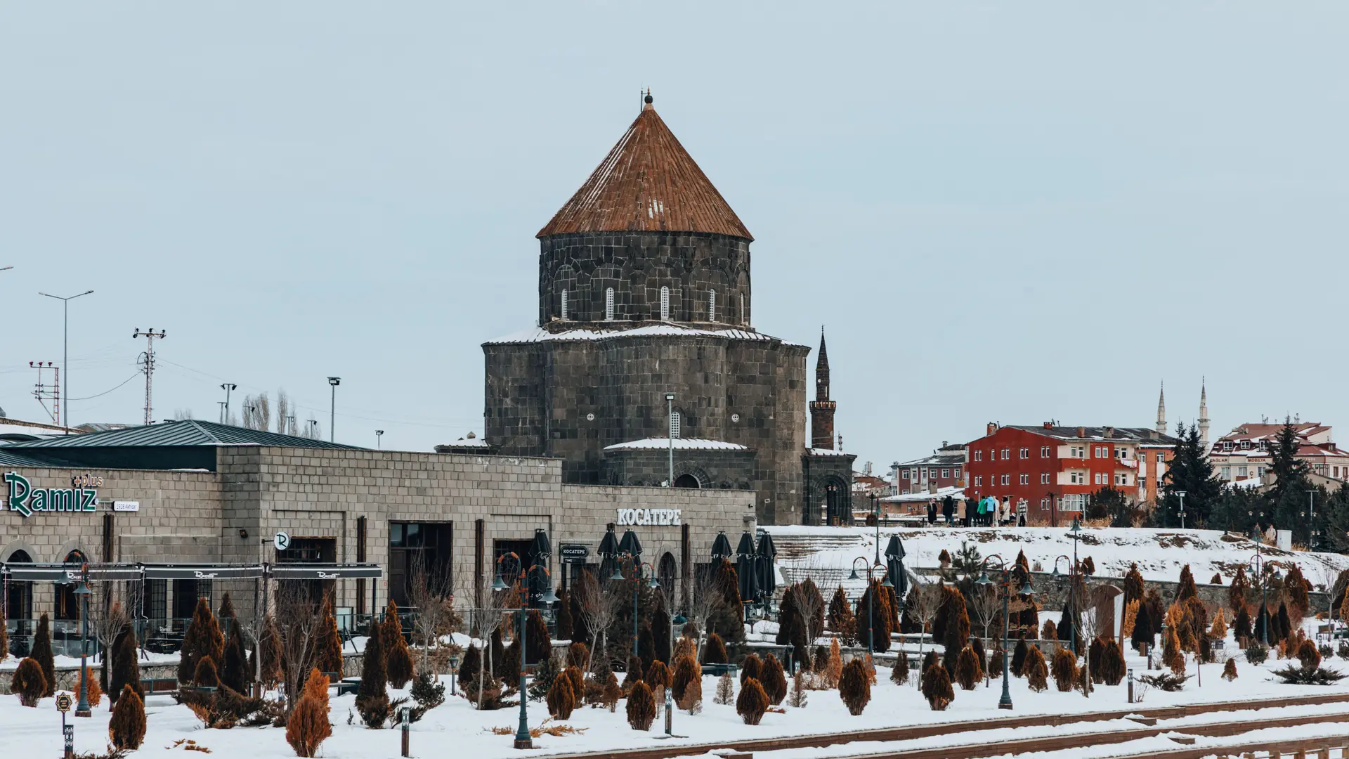 Historic stone church standing in the snowy centre of Kars