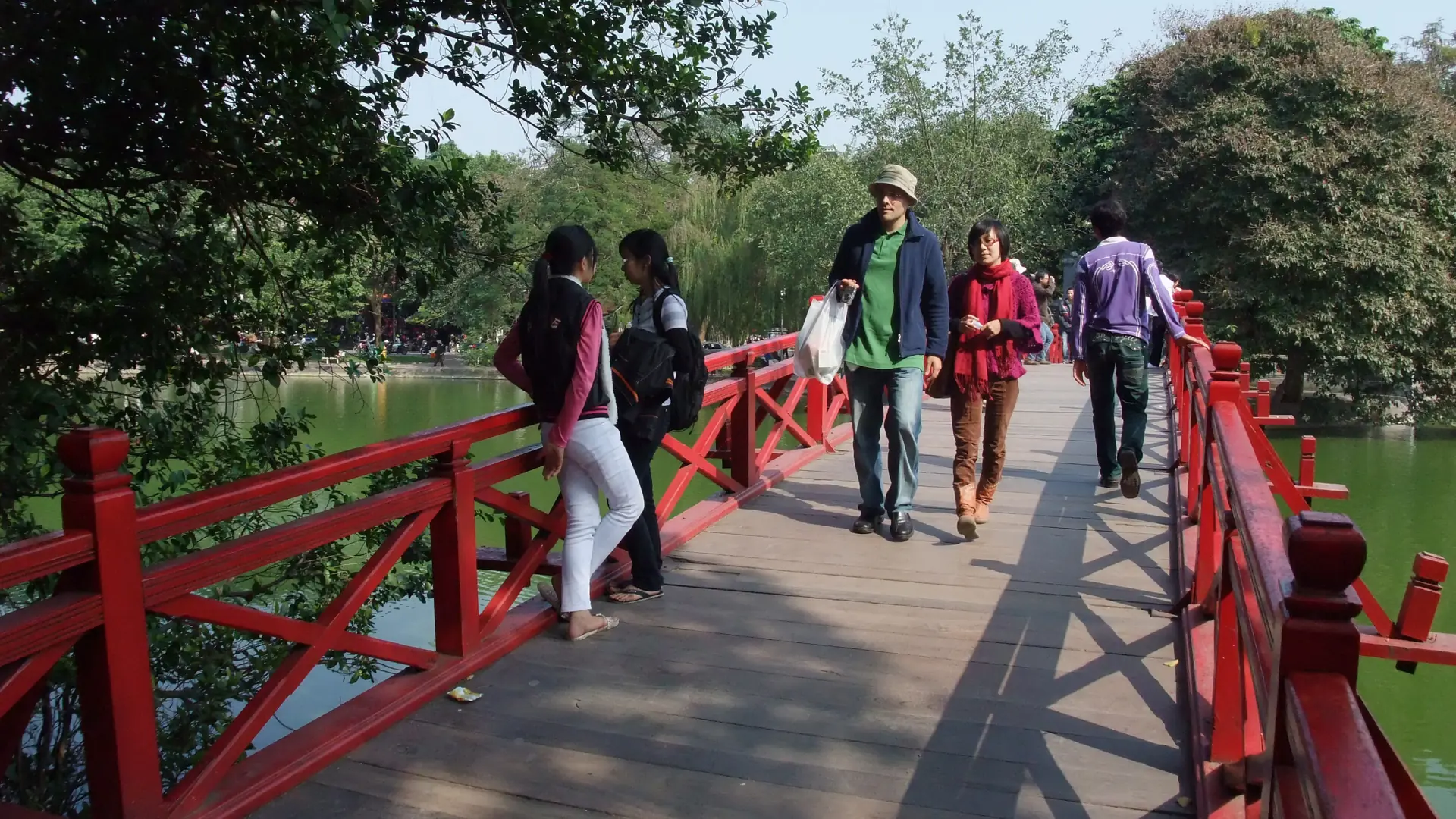 Red The Huc Bridge crossing Hanoi’s Hoan Kiem Lake