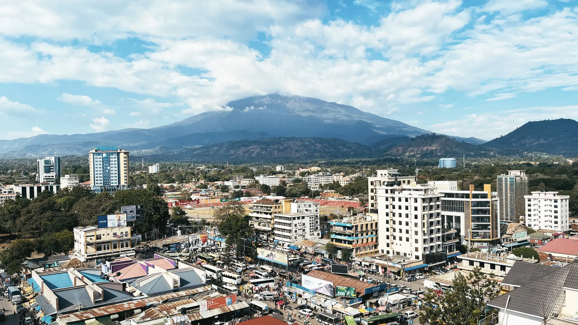 Sunny Arusha cityscape with Mount Meru or an identifiable town scene