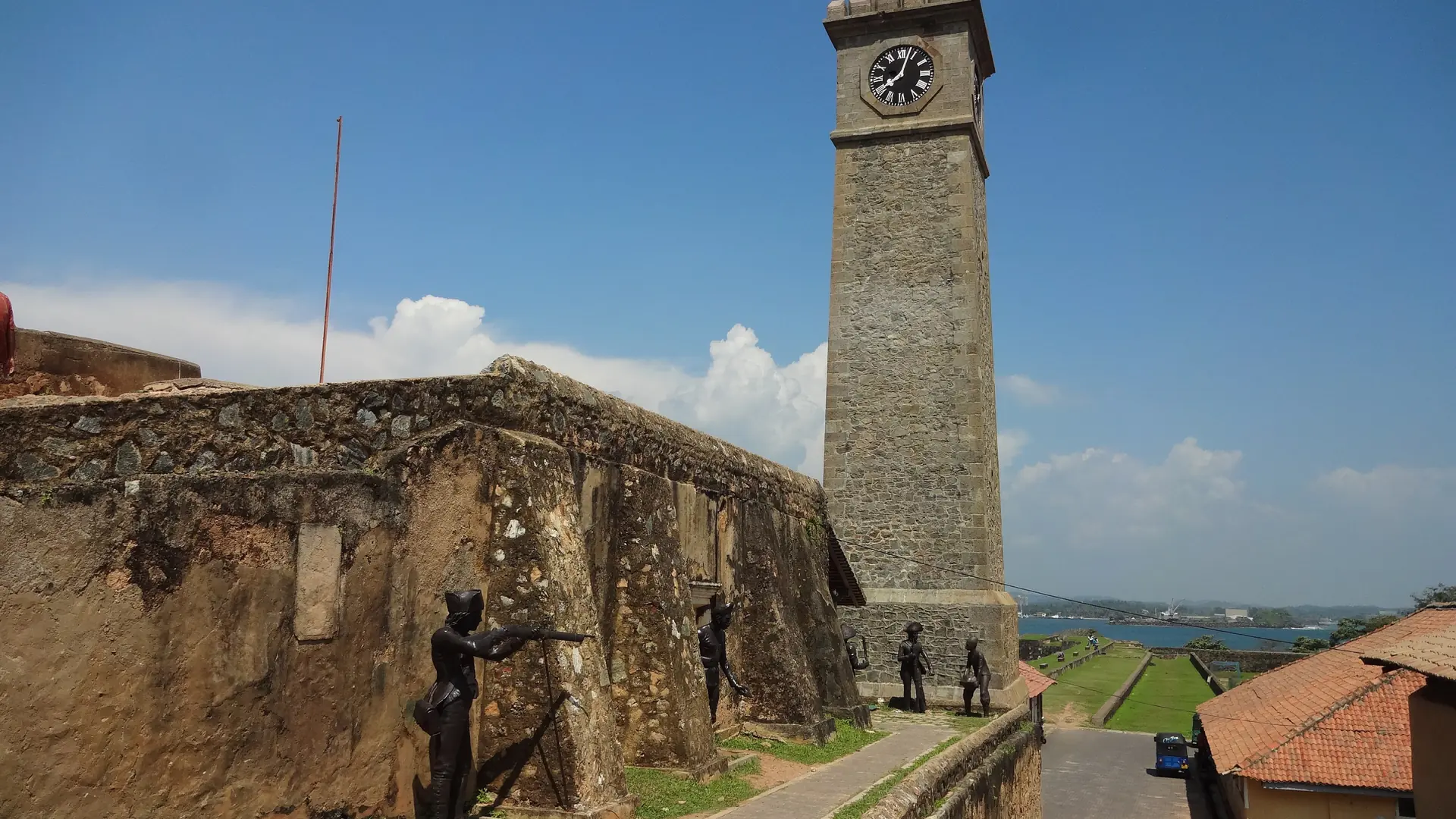 Galle Fort Clock Tower above the ramparts under a blue sky