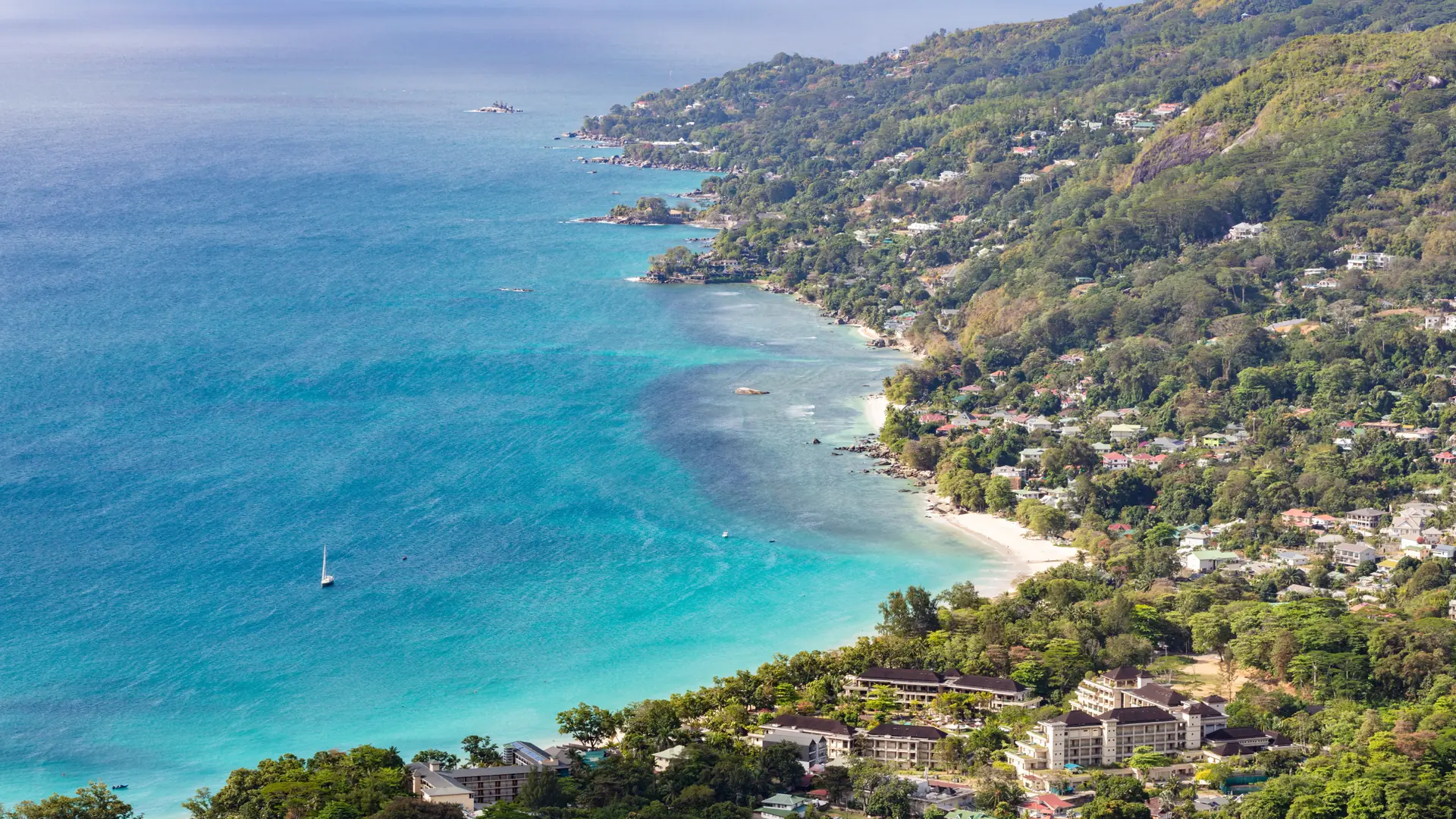 Beau Vallon bay viewed from a hill path above the coast