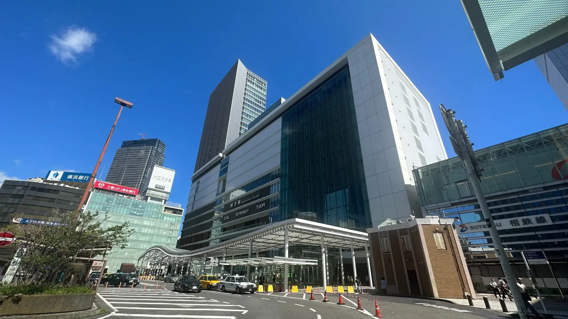 modern Yokohama Station skyline and bright plaza in clear daytime