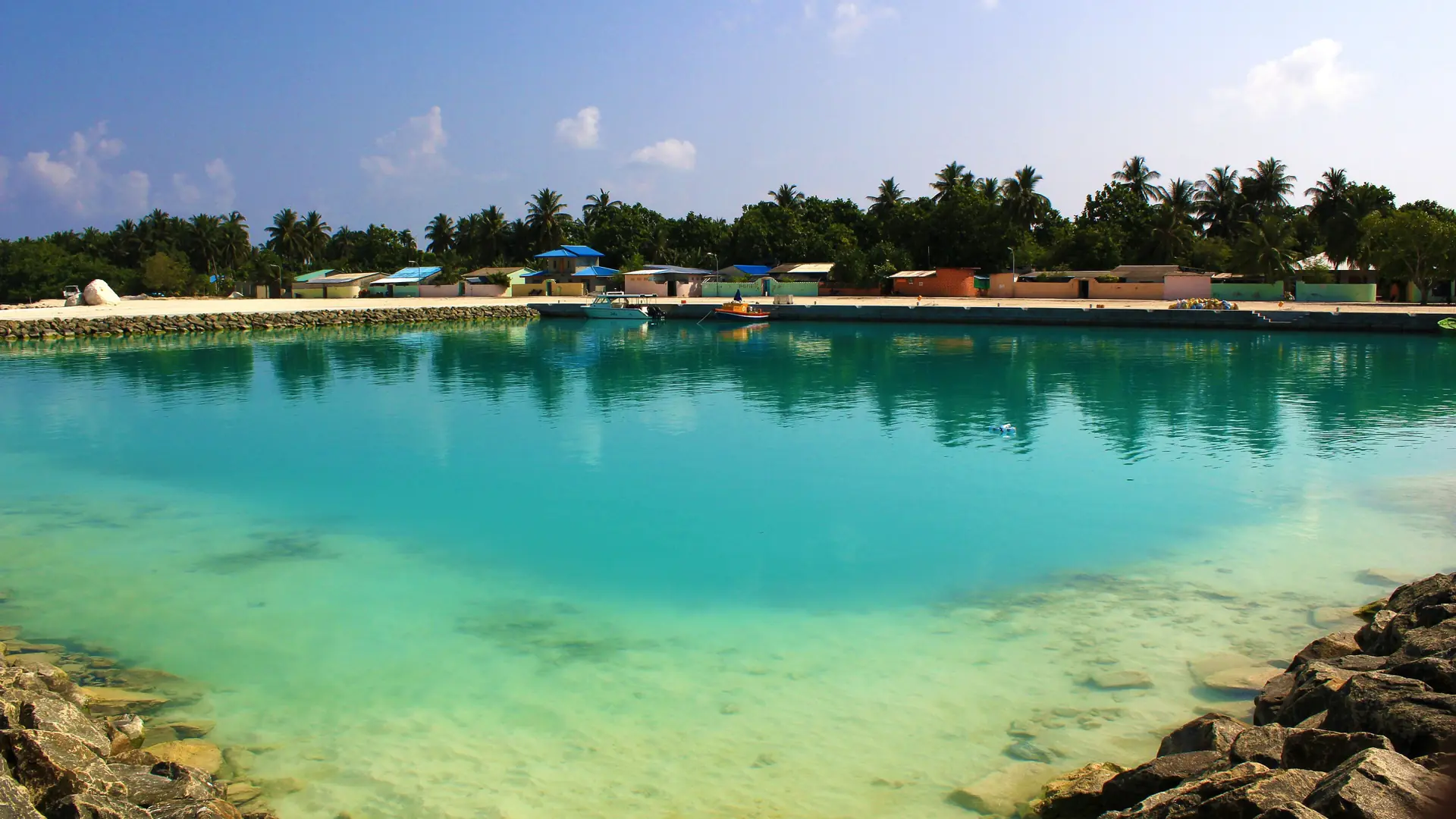 Turquoise Ukulhas harbour lagoon seen from the front jetty
