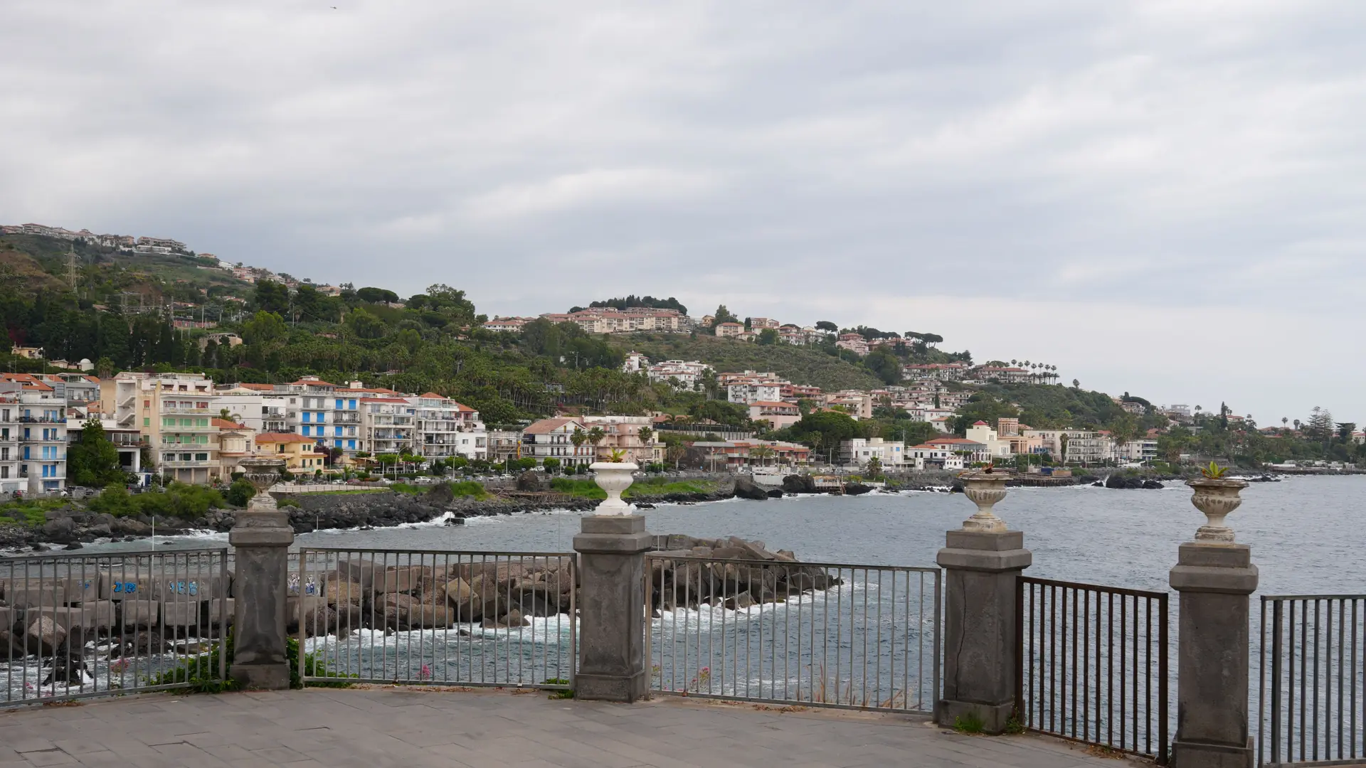 a stone-balustraded coastal promenade overlooking the Atlantic near Funchal's seafront