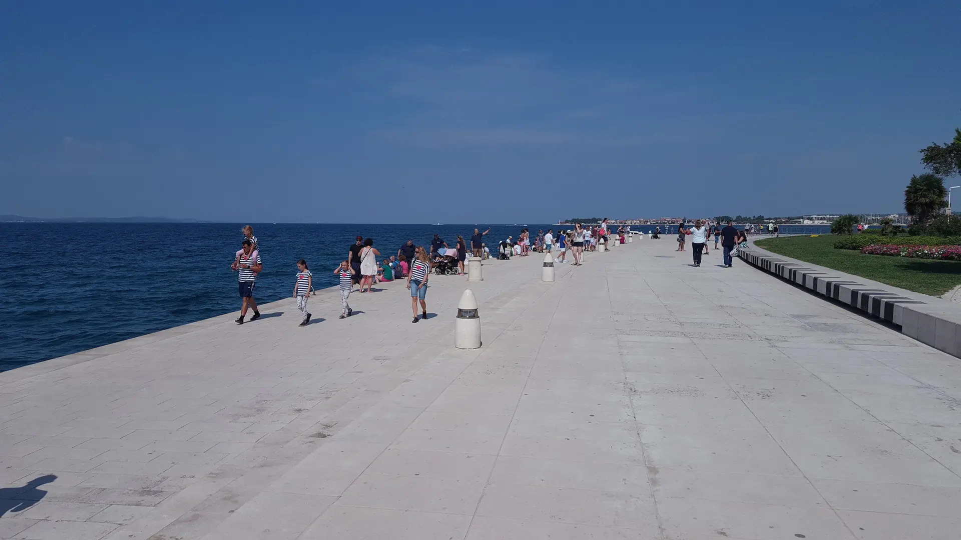 Zadar's waterfront promenade facing the old town across bright Adriatic water
