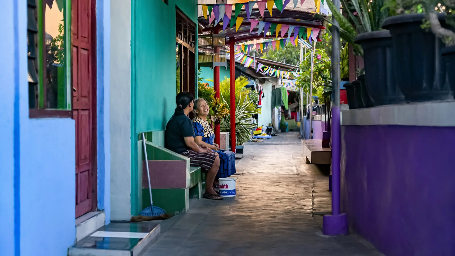 Colourful residential lane in Yogyakarta, with bunting and brightly painted houses