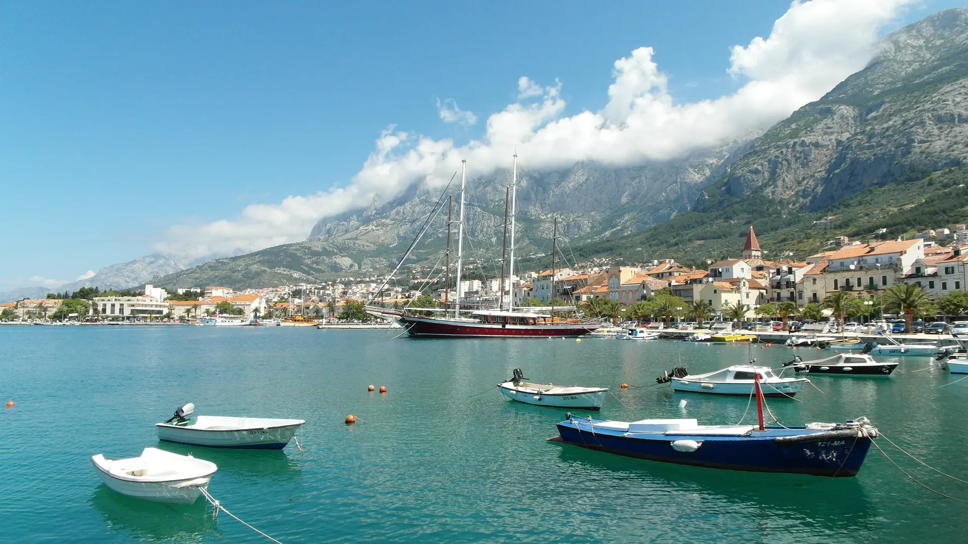 Boats moored beside Makarska’s old town and harbour