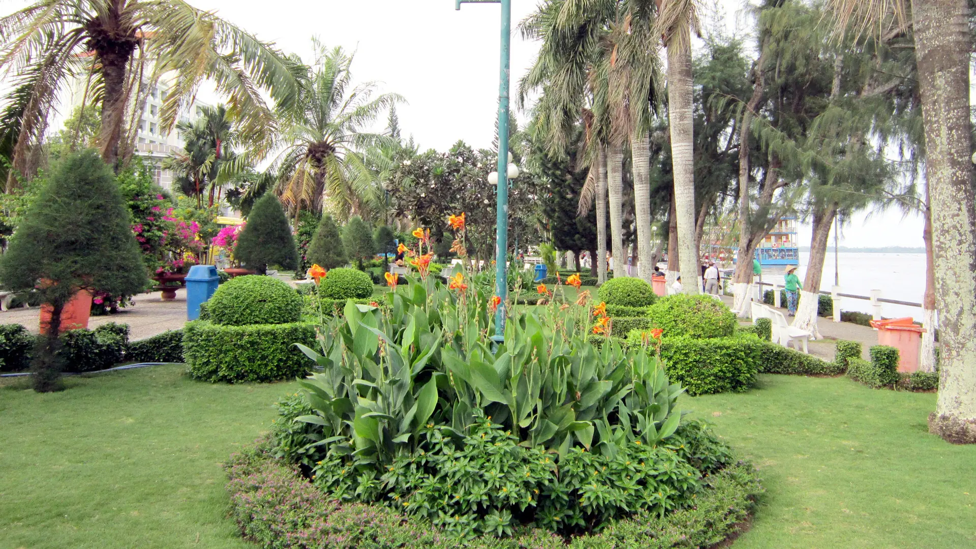 Palm trees, flowers and green paths in Ninh Kieu waterfront park