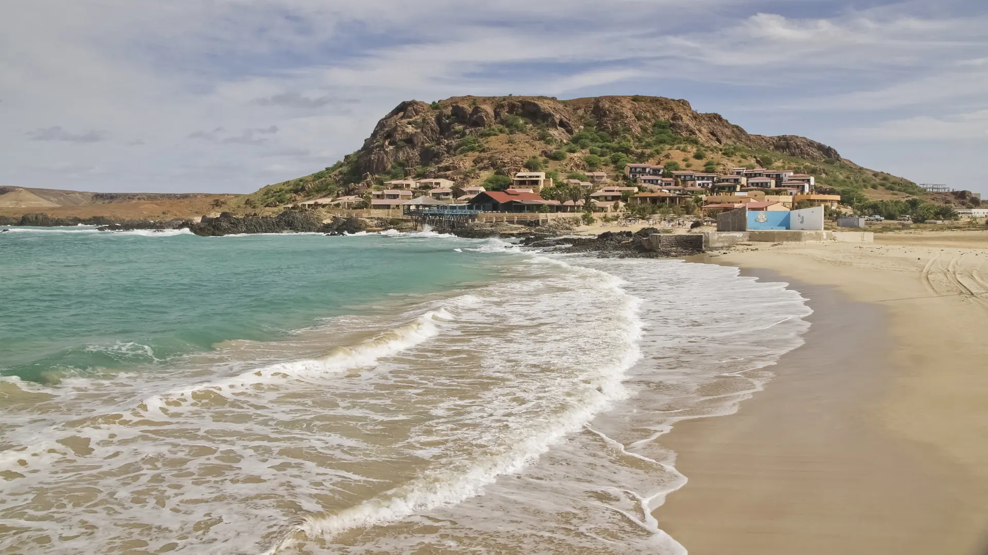 Sandy Praia de Cruz cove beneath Rochinha hill on Boa Vista