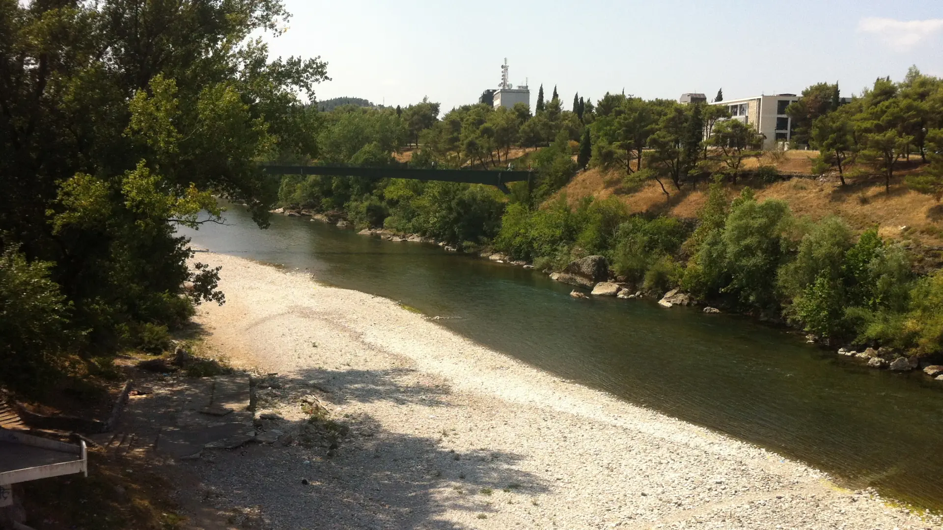 Morača River winding past wooded banks in Podgorica