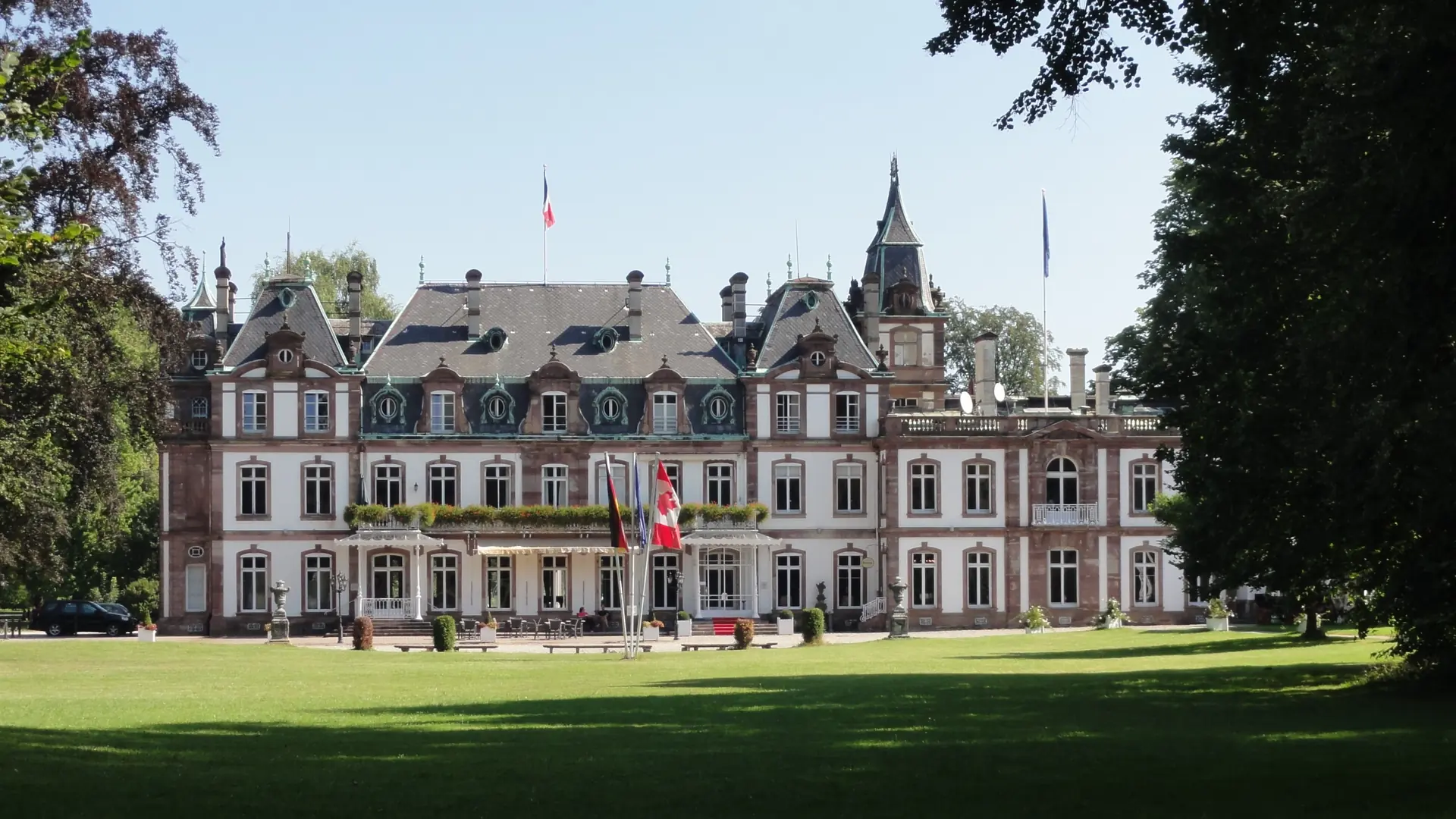 Château de Pourtalès and its green lawn in Strasbourg’s Robertsau district