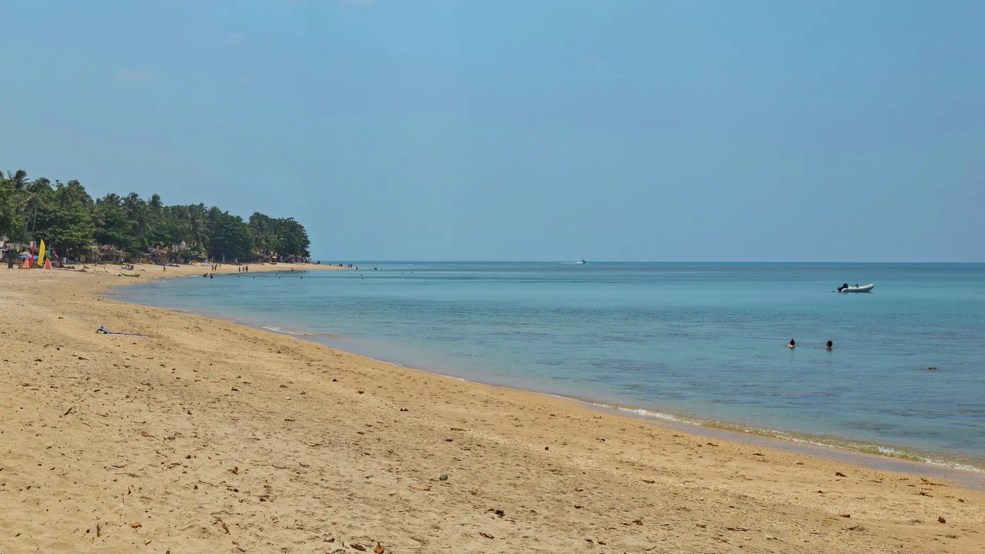 A sheltered Koh Lanta bay enclosed by deep-green hills