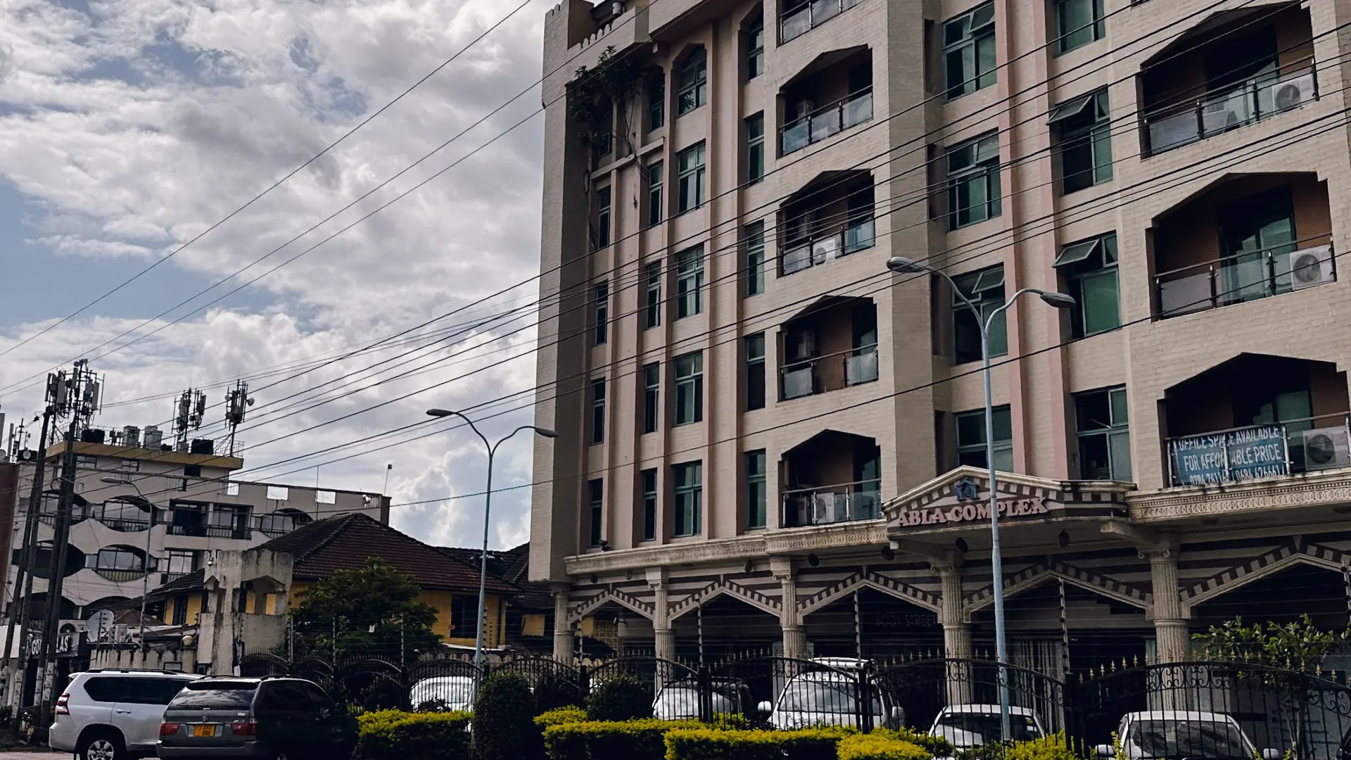 Multistorey building and roadside frontage in Mikocheni, Dar es Salaam