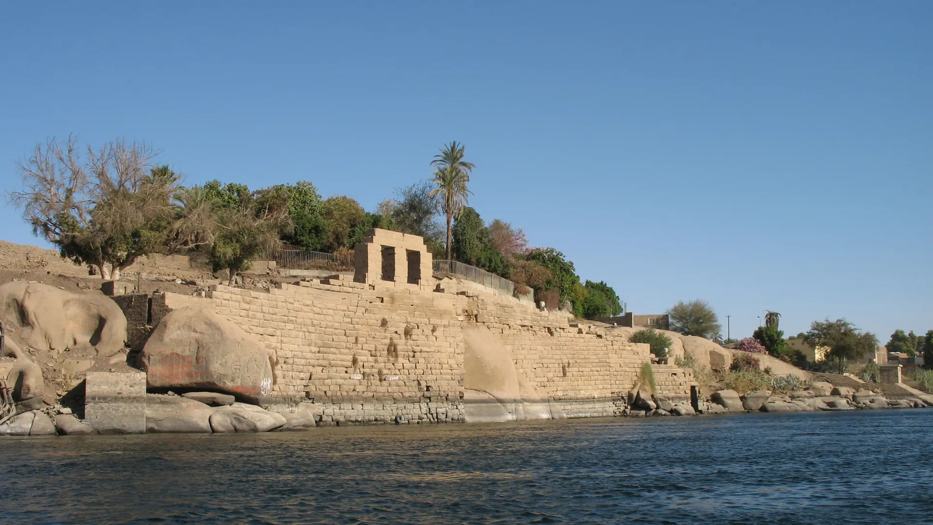 Elephantine Island shoreline and stone ruins above the Nile